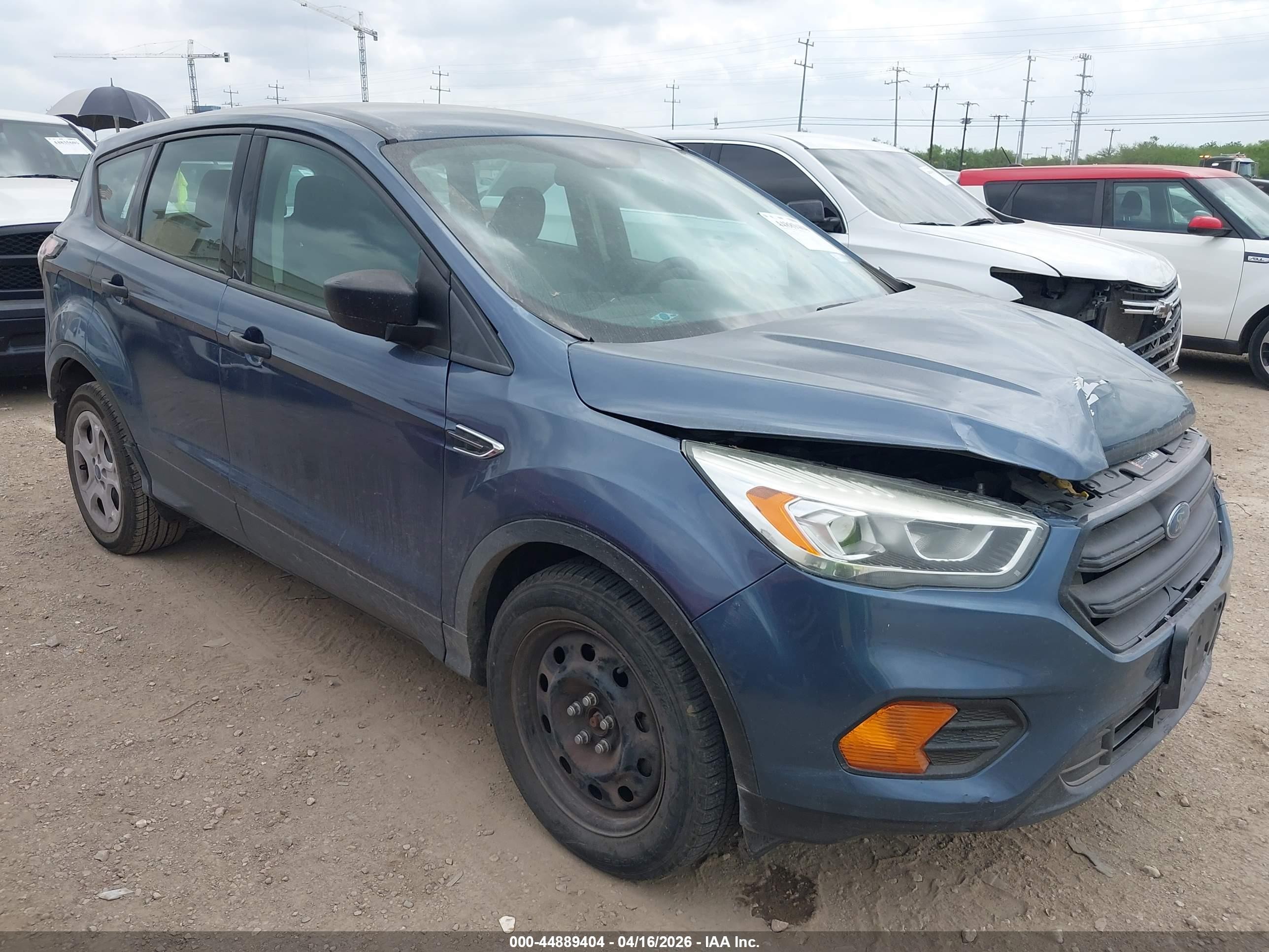 2018 Ford Escape S, VIN 1FMCU0F7XJUA30375 — Side