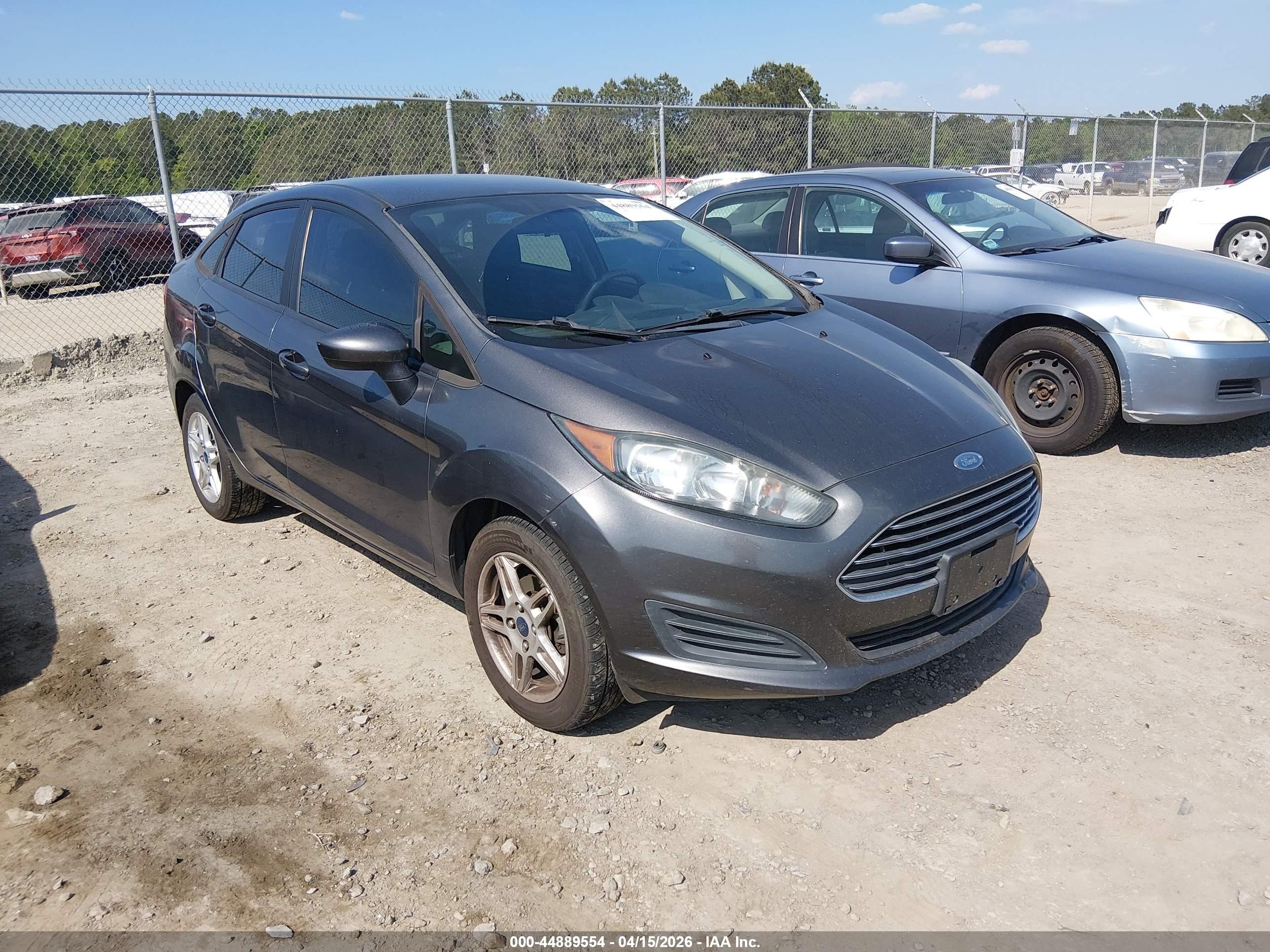 2019 Ford Fiesta SE, VIN 3FADP4BJ7KM120569 — Side
