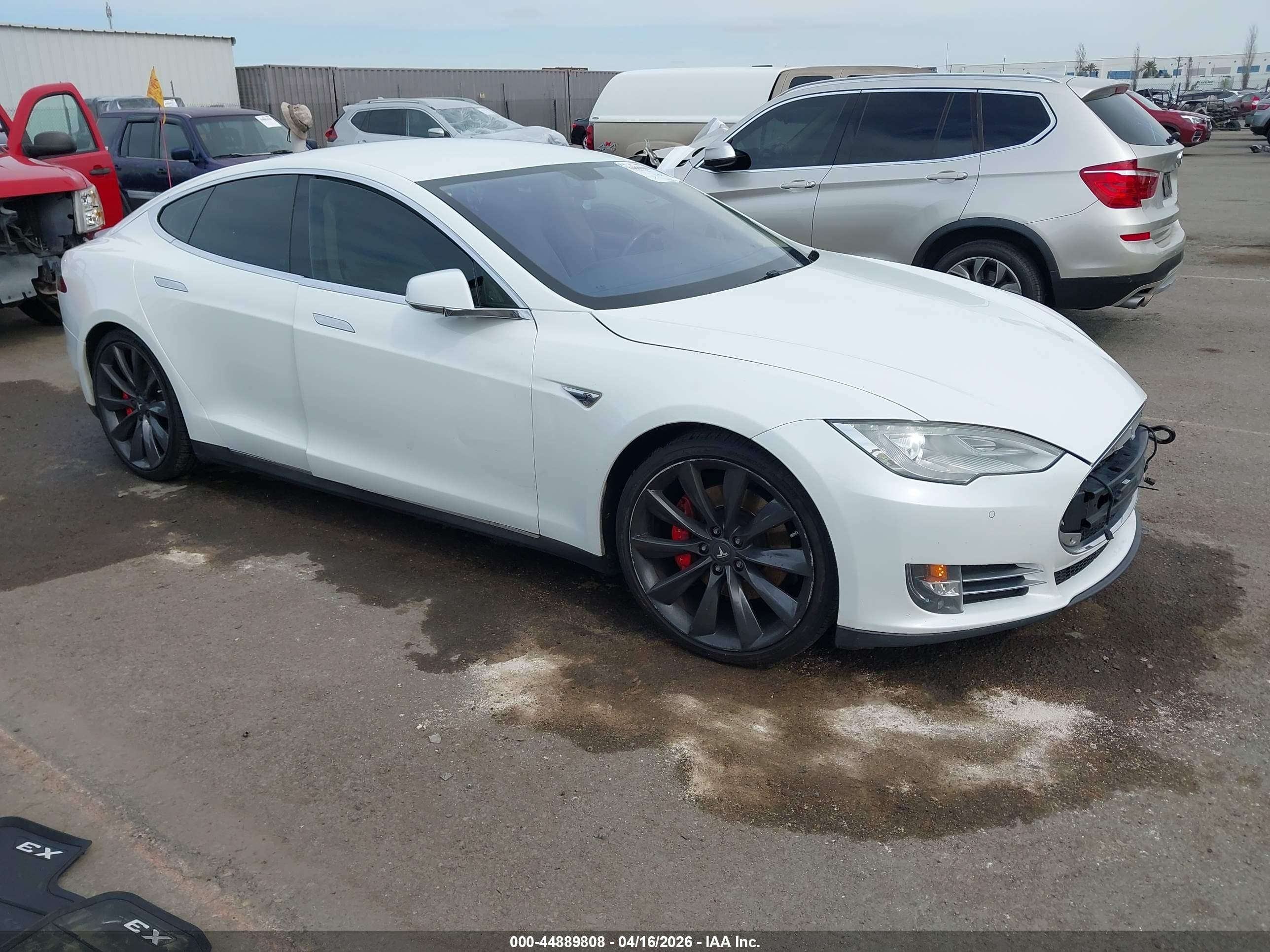 2014 Tesla Model S 60, VIN 5YJSA1H12EFP36181 — Water / flood