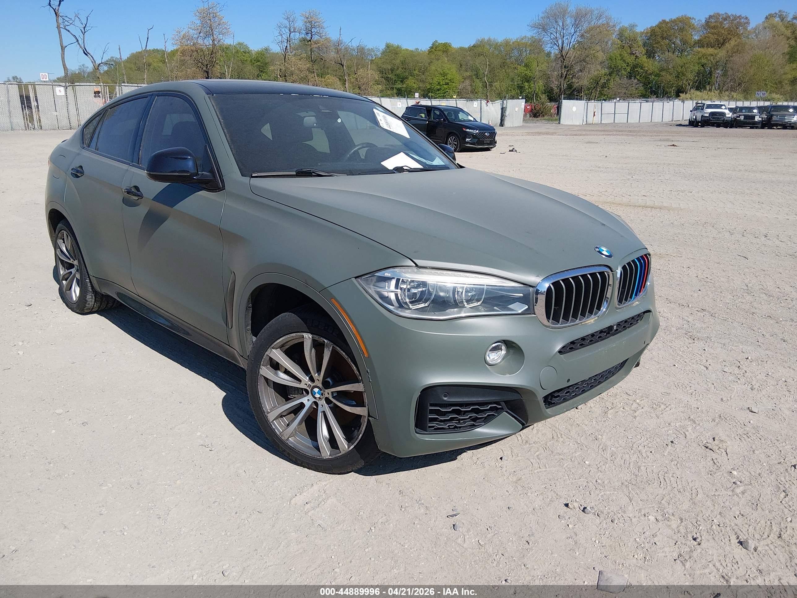 2016 BMW X6 xDrive50i, VIN 5UXKU6C58G0R33953 — Undercarriage