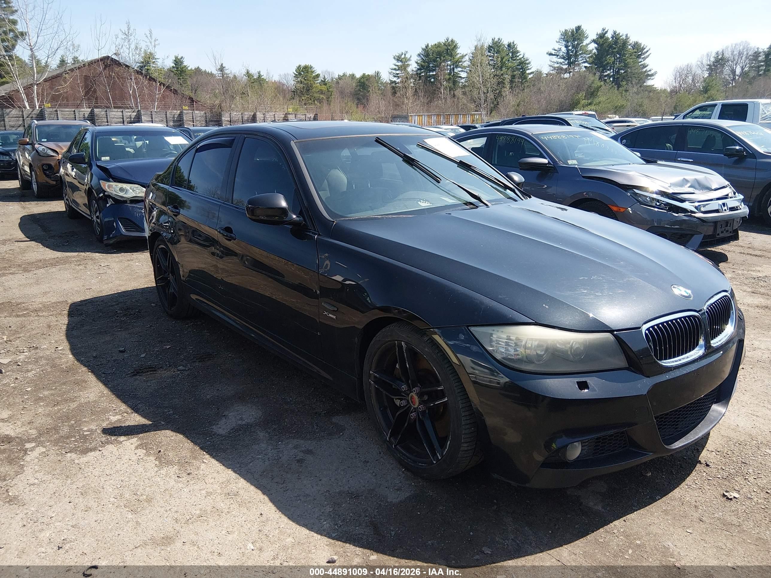 2011 BMW 3 Series 335i xDrive, VIN WBAPL5G59BNN23380 — Rear end
