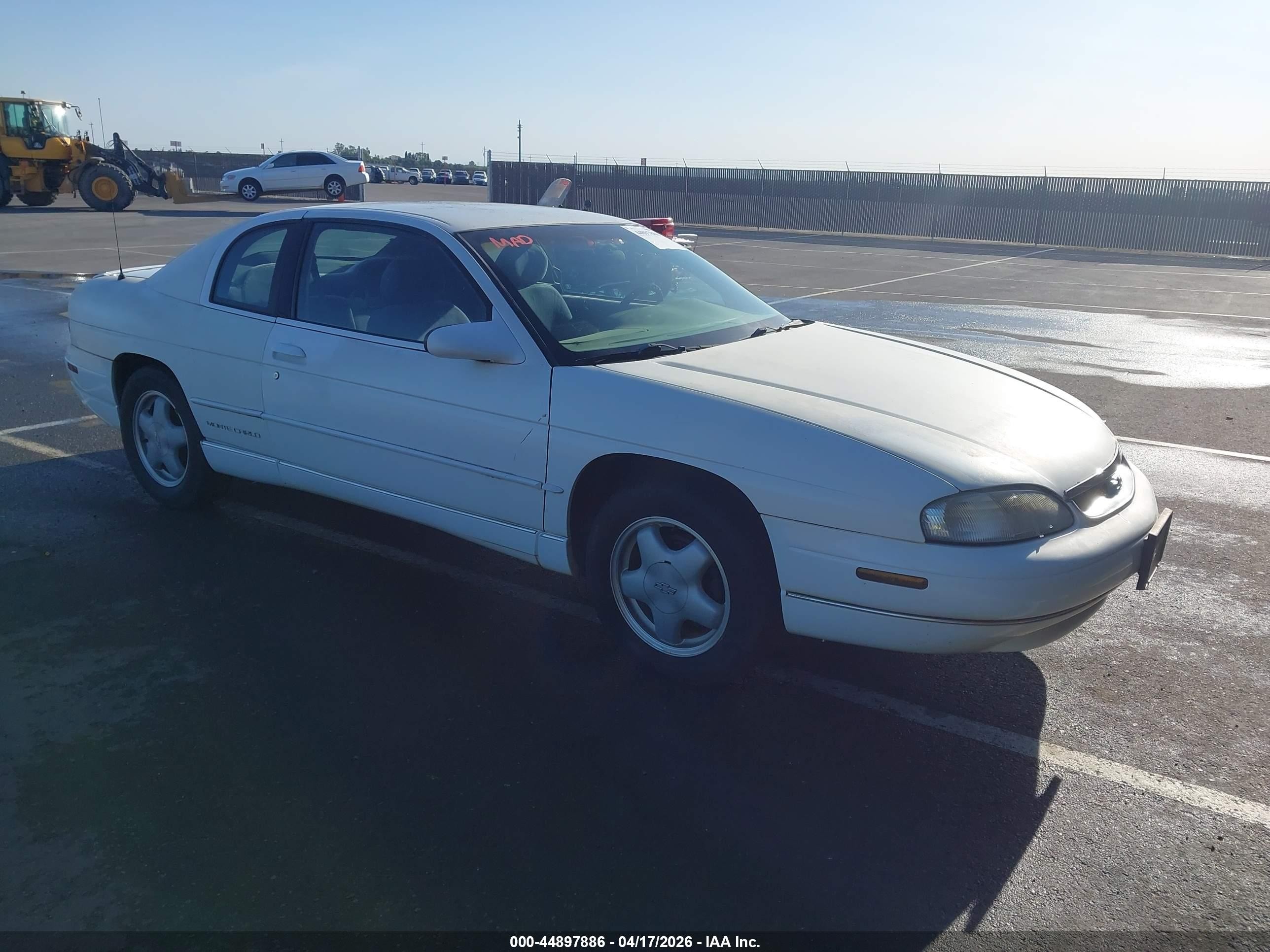 1999 Chevrolet Monte Carlo LS, VIN 2G1WW12M7X9272097 — Side