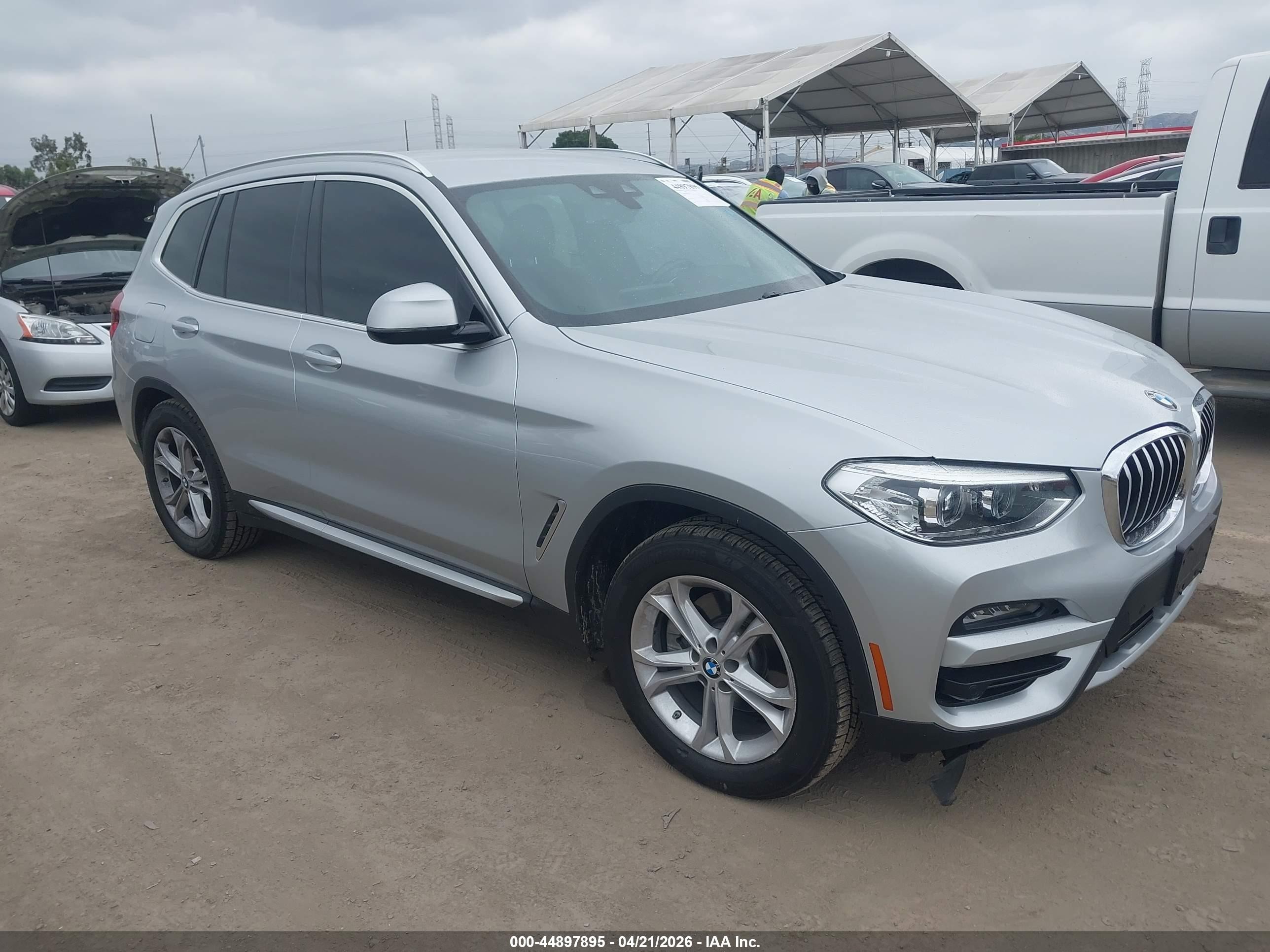 2021 BMW X3 xDrive30i, VIN 5UXTY5C07M9F07219 — Side