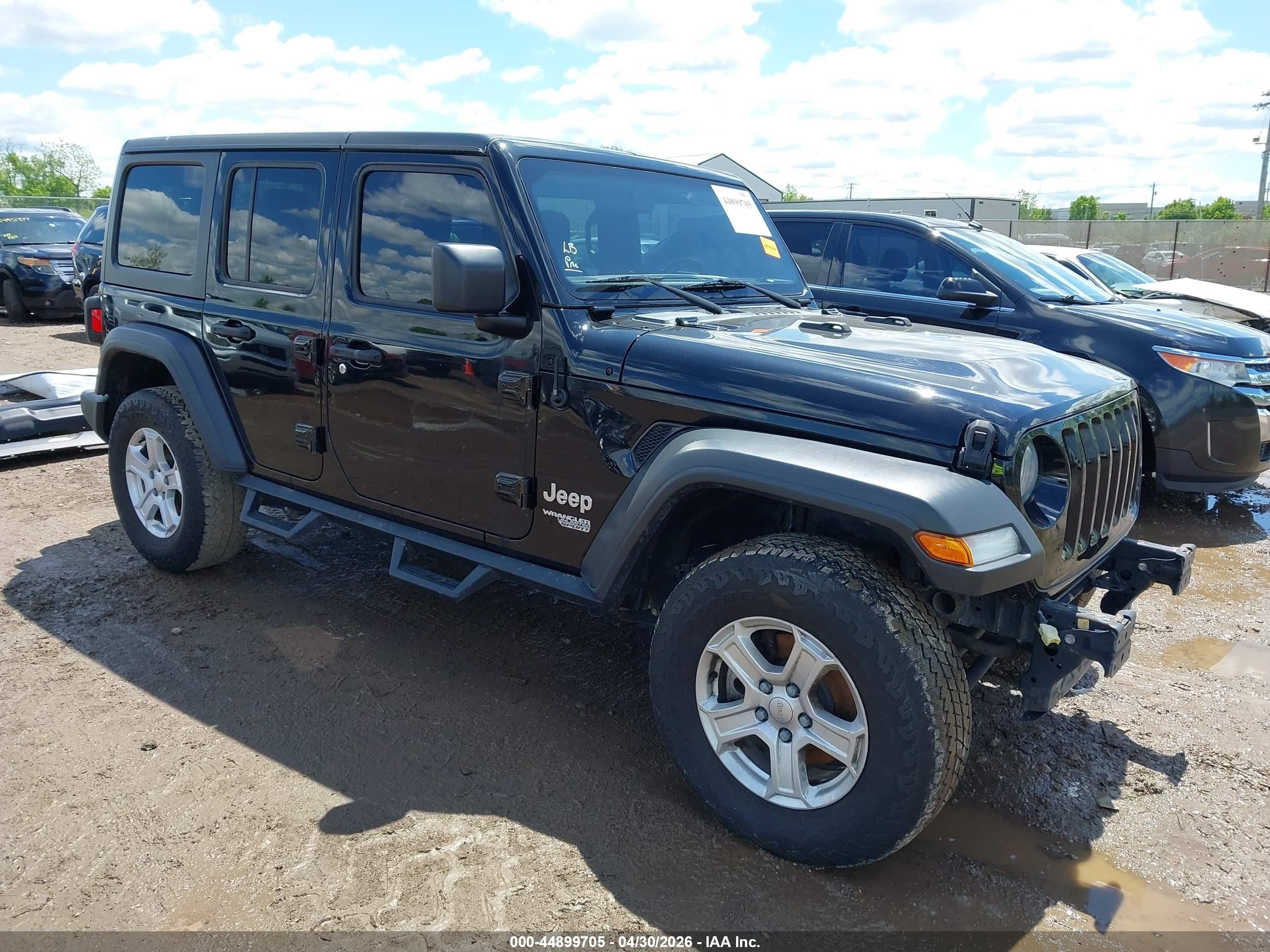 2018 Jeep Wrangler Unlimited Sport, VIN 1C4HJXDG8JW113435 — Side
