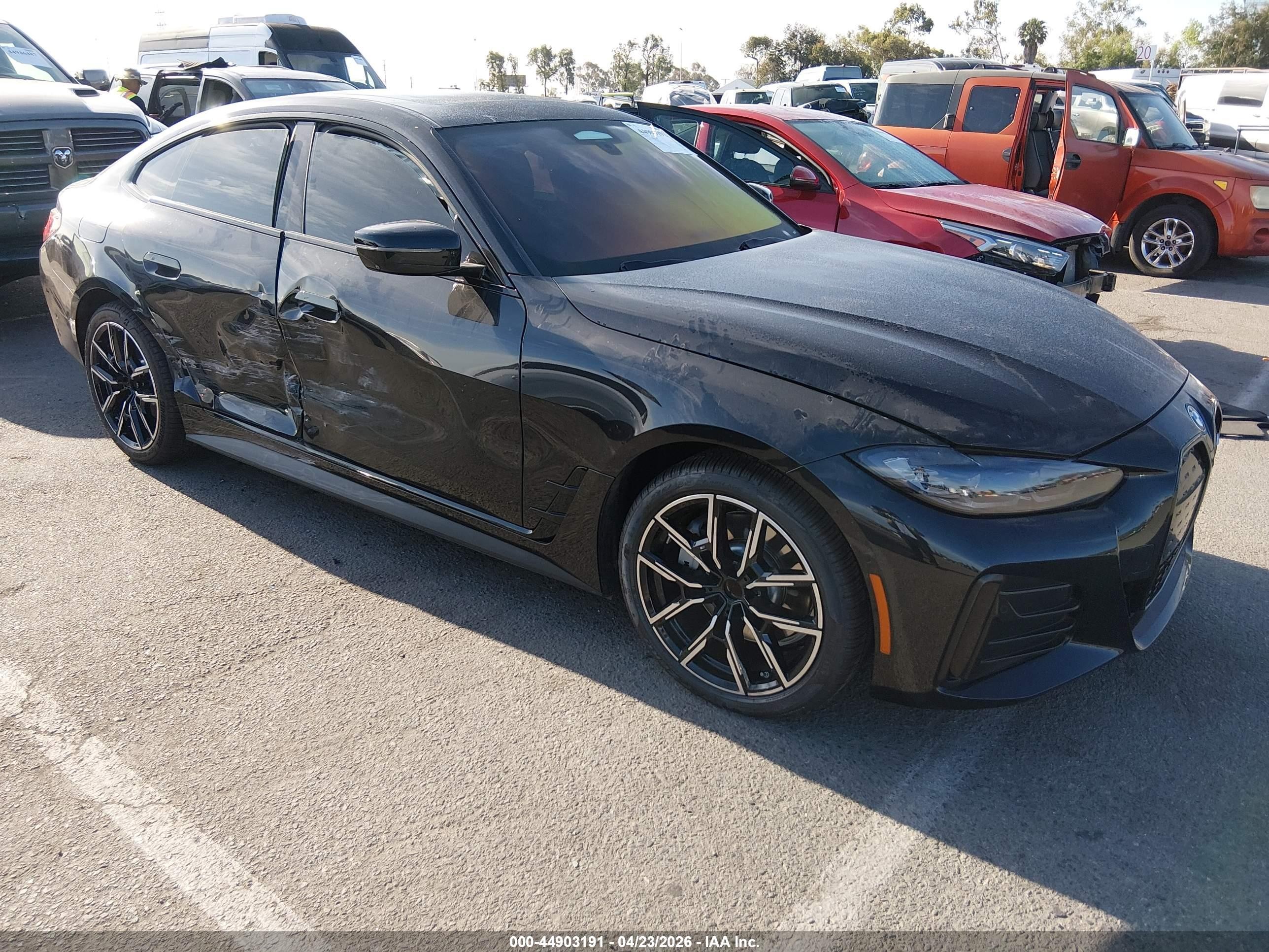 2022 BMW i4 eDrive40, VIN WBY73AW00NFN12444 — Side