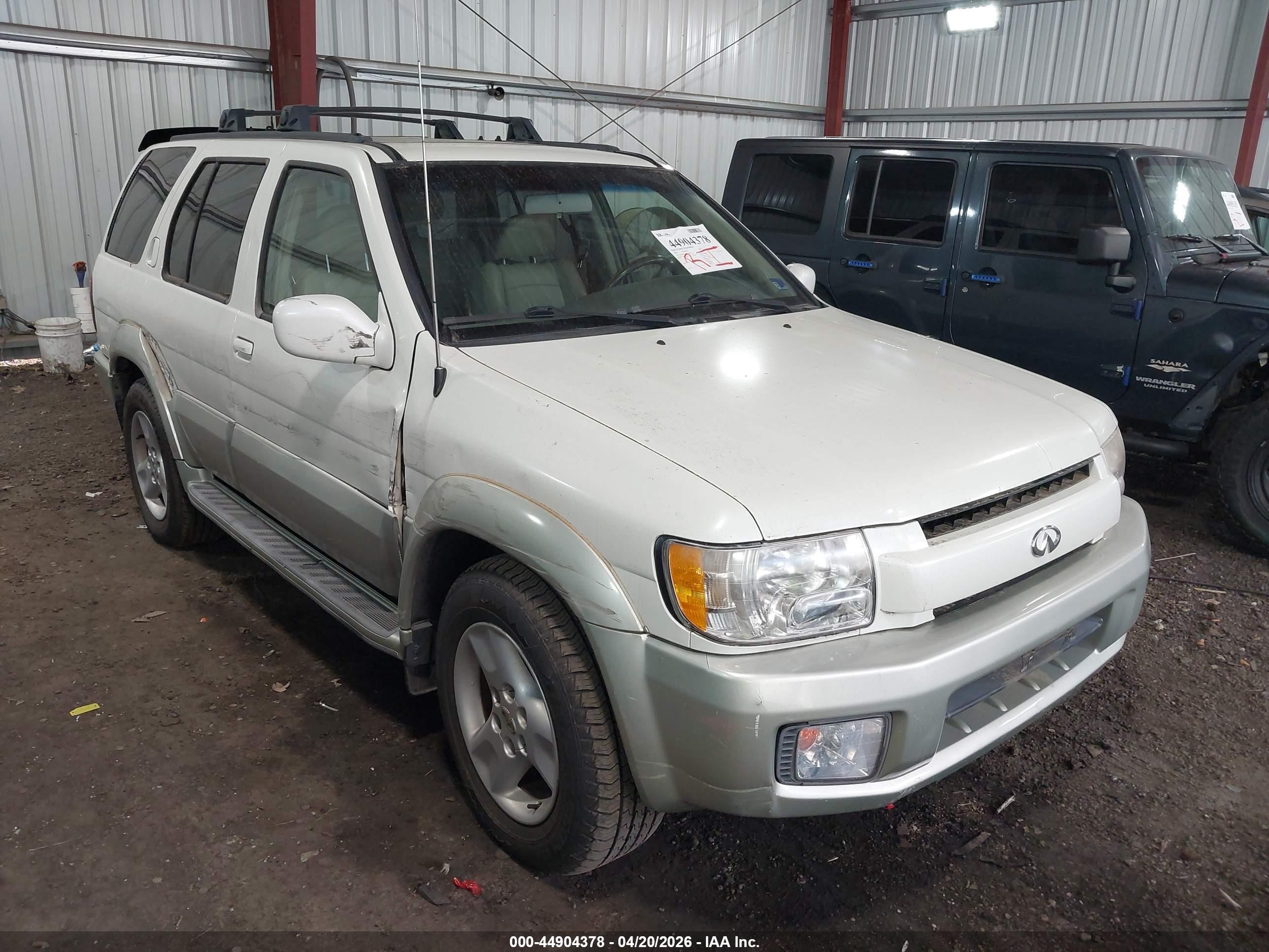 2003 Infiniti QX4 Luxury, VIN JNRDR09Y53W301980 — Side