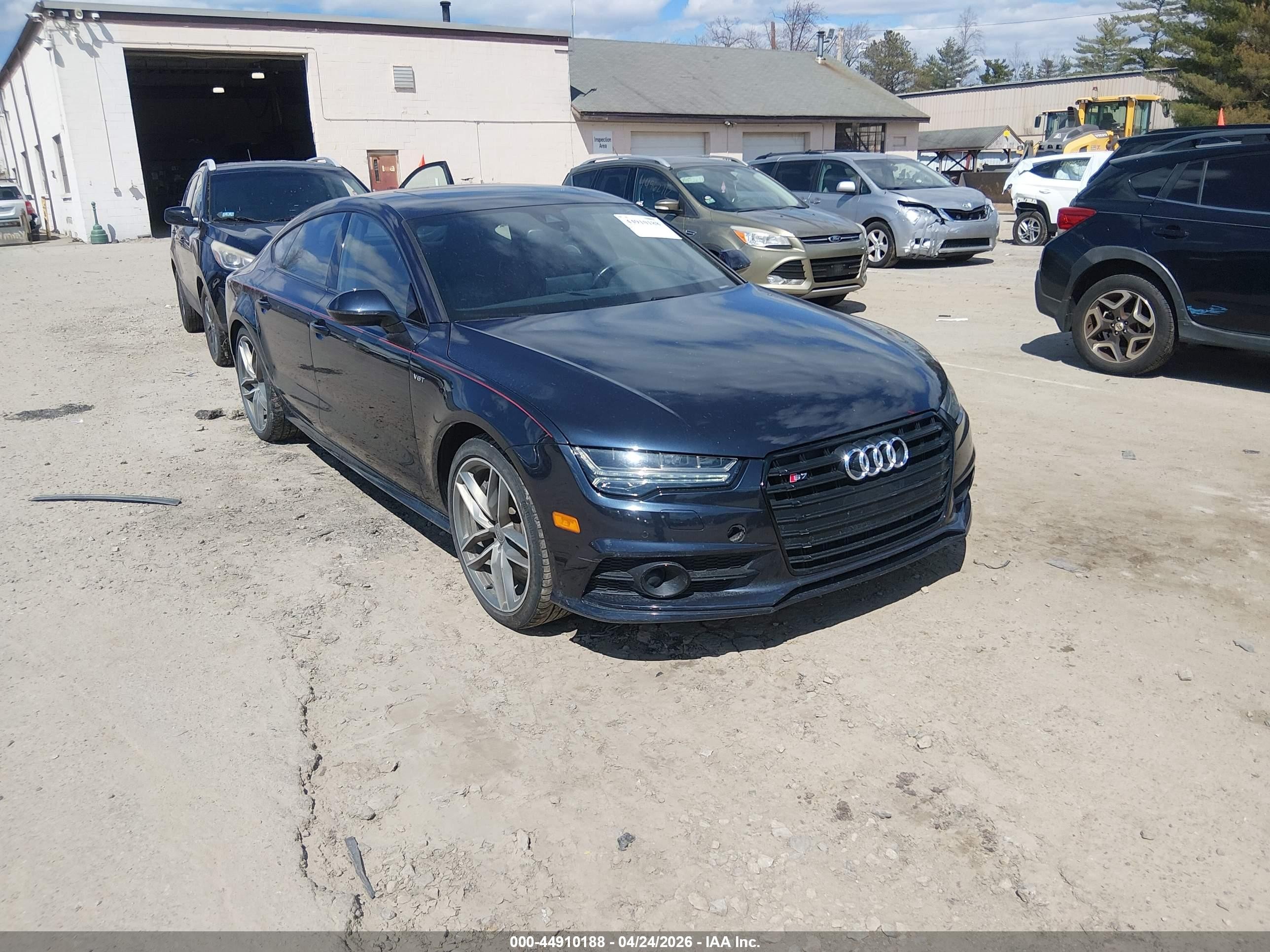 2018 Audi S7 Premium Plus, VIN WAUWFAFC6JN037281 — Rear end