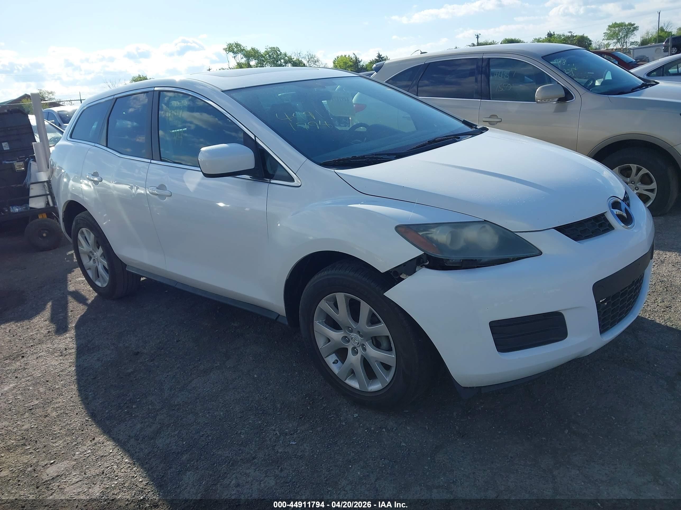 2009 Mazda CX-7 Touring, VIN JM3ER29L890238347 — Front end