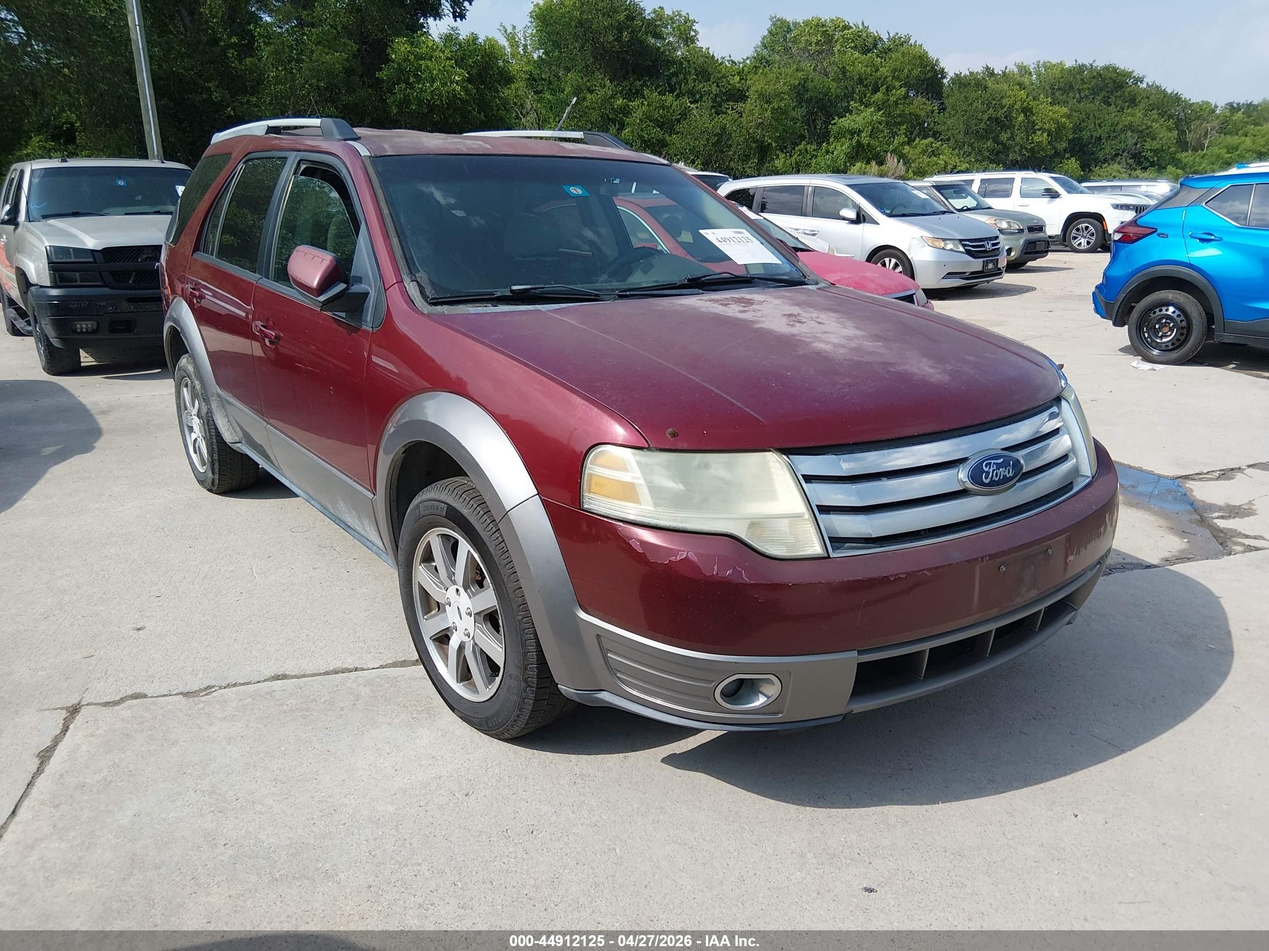 2008 Ford Taurus X SEL, VIN 1FMDK02W18GA43144 — Normal wear
