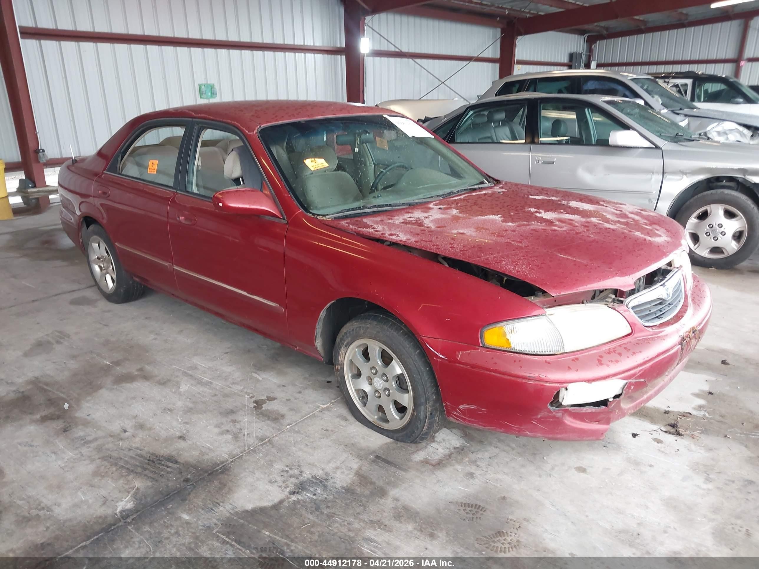 1999 Mazda 626 LX, VIN 1YVGF22D8X5856078 — Normal wear