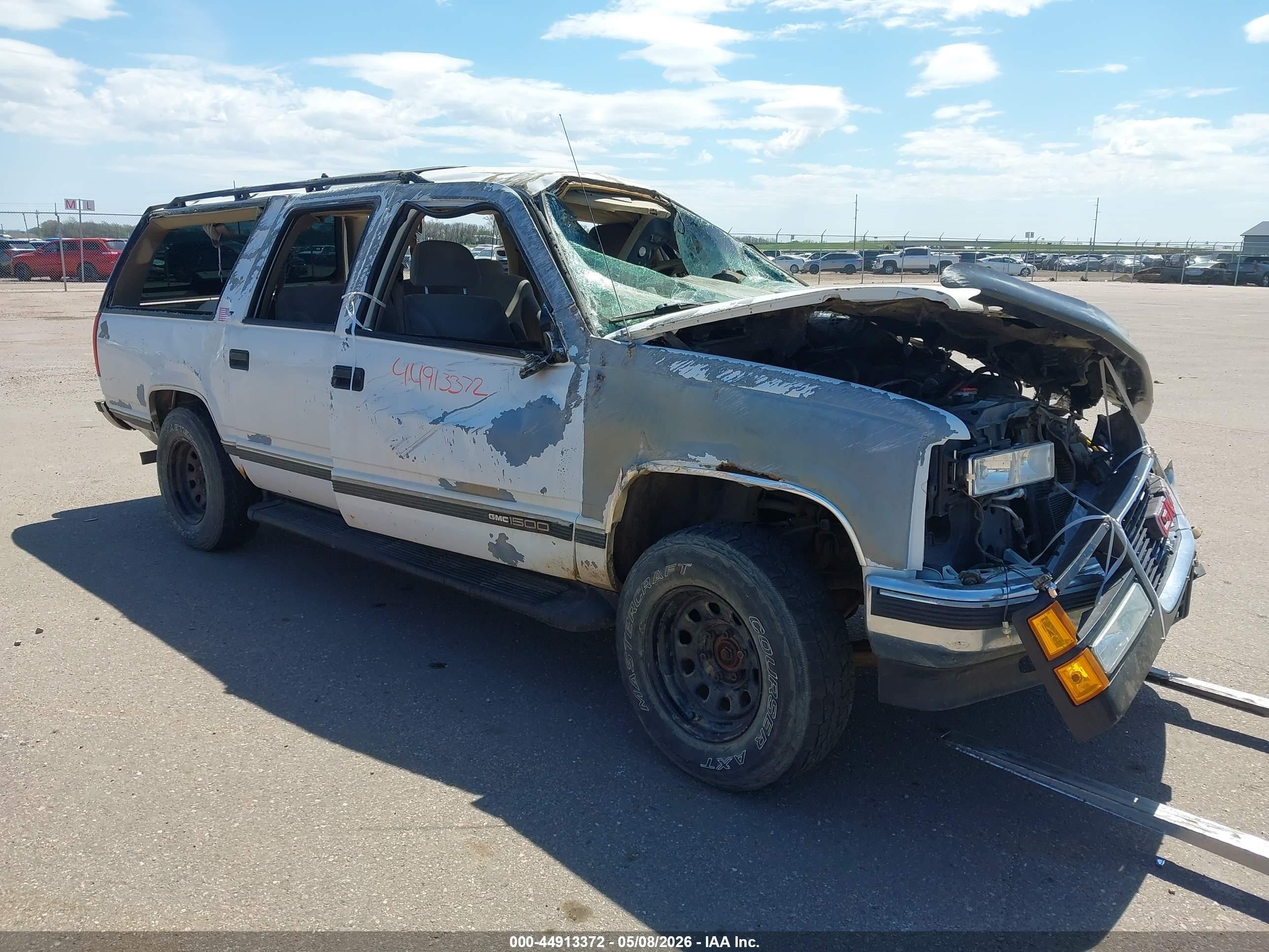 1999 GMC Suburban, VIN 3GKFK16R6XG518768 — Rollover