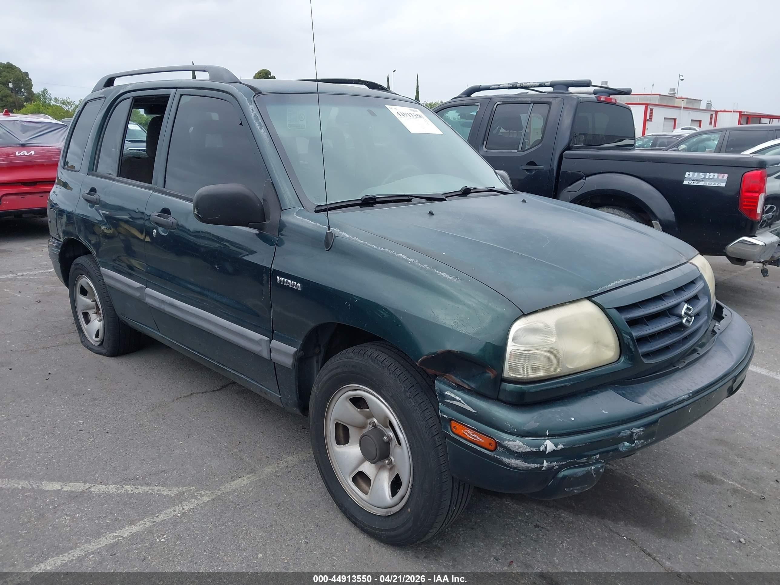 2003 Suzuki Vitara, VIN 2S3TE52V936101099 — Бок