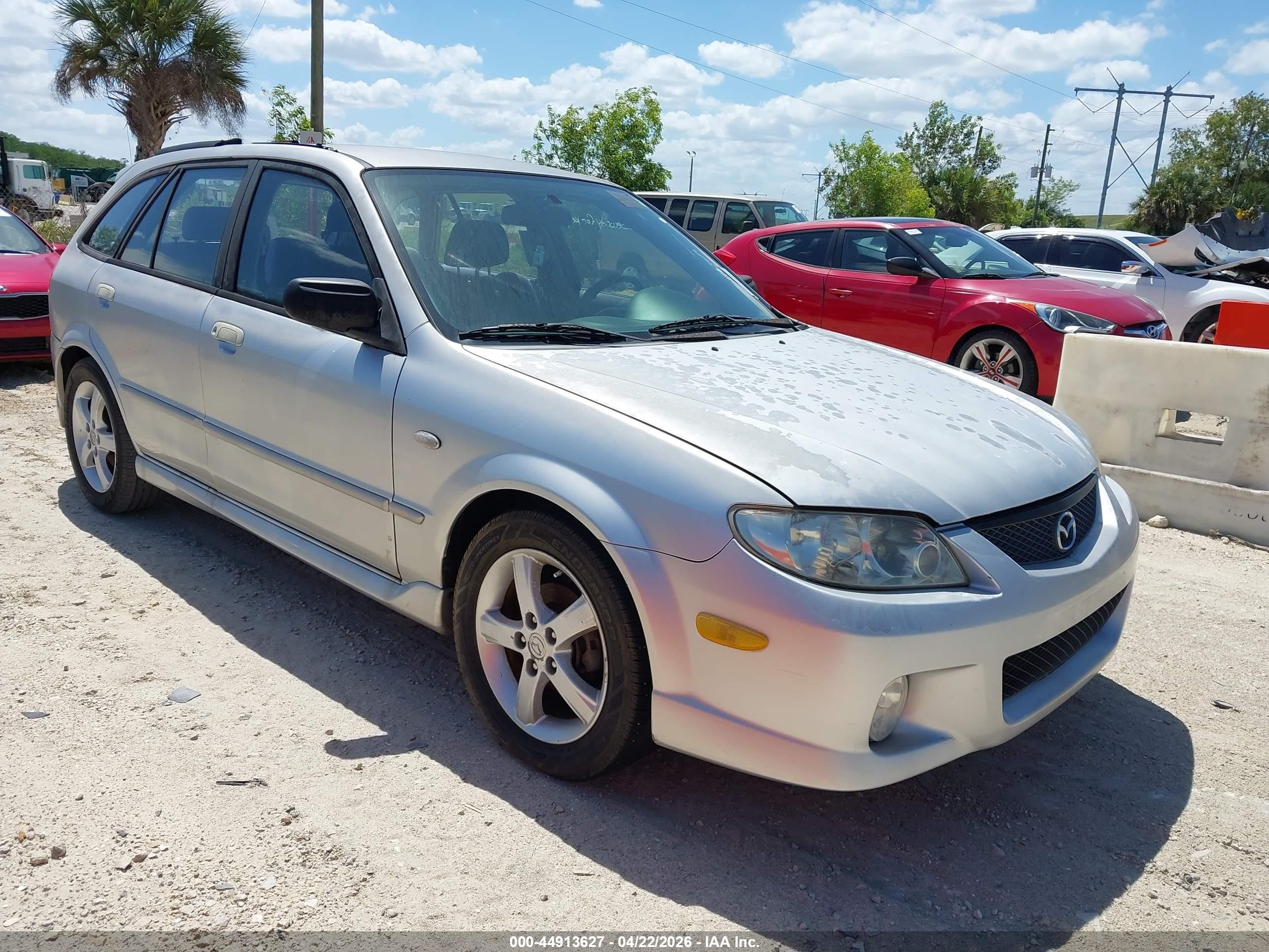 2002 Mazda Protege, VIN JM1BJ245621619044 — Normal wear