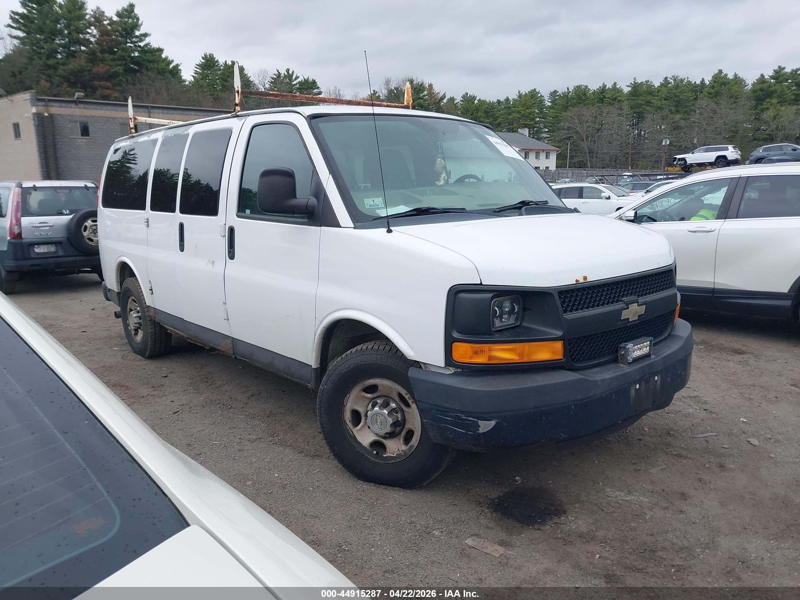 2012 Chevrolet Express Passenger 1LS, VIN 1GAWGPFA2C1190647 — Normal wear