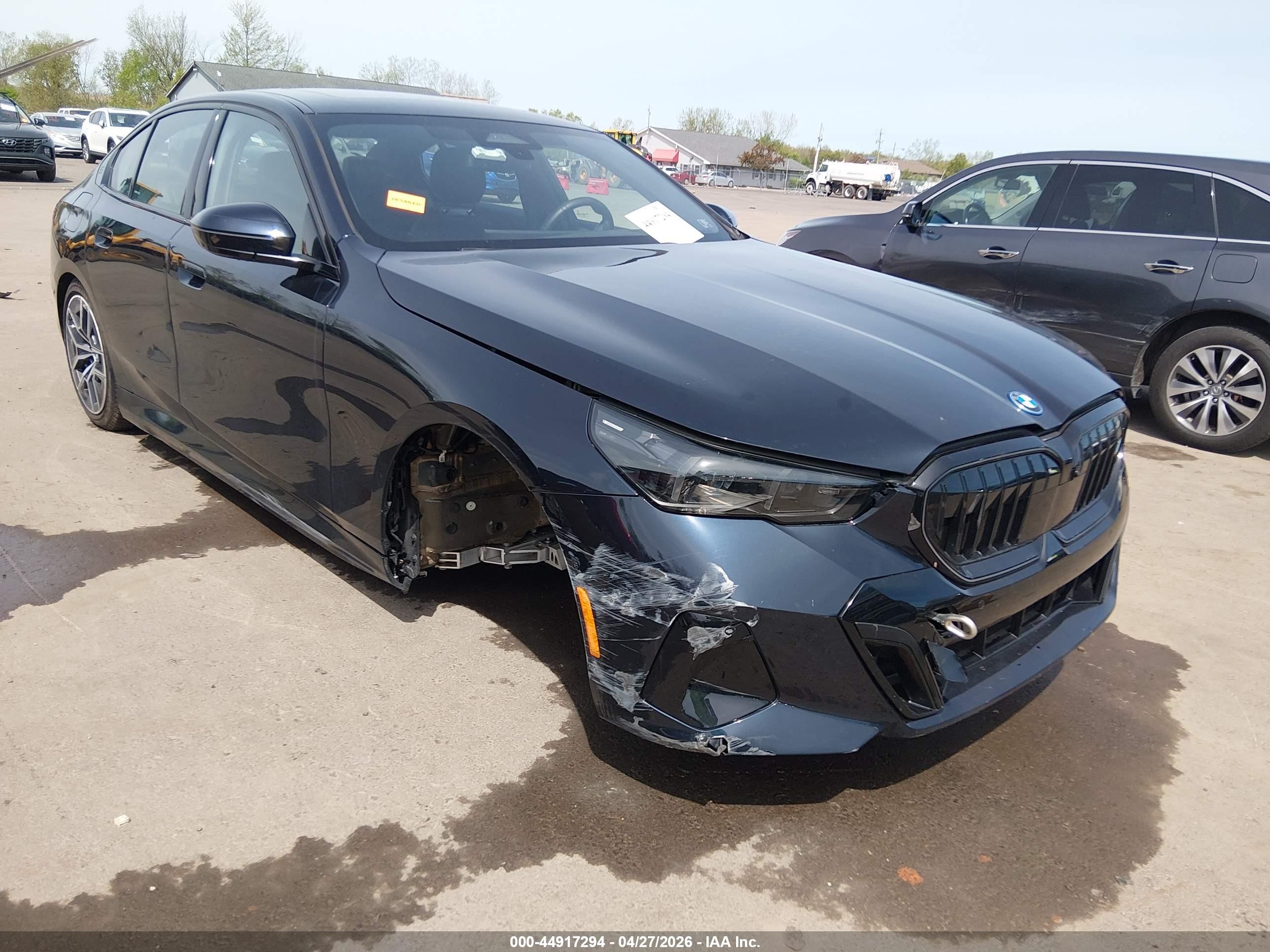 2025 BMW i5 xDrive40, VIN WBY13HG03SCT76899 — Side