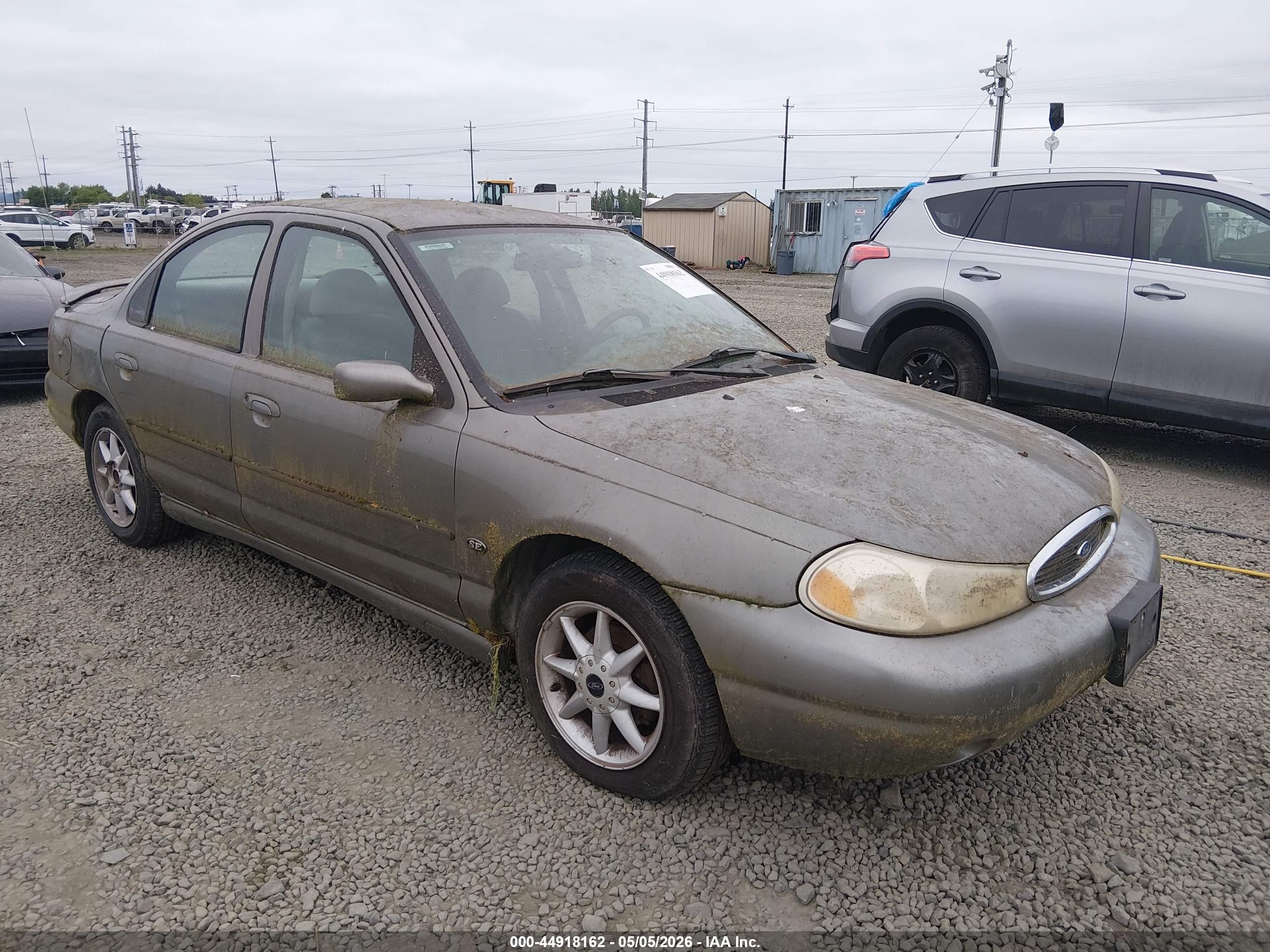 1998 Ford Contour LX, VIN 1FAFP66L9WK311942 — Normal wear