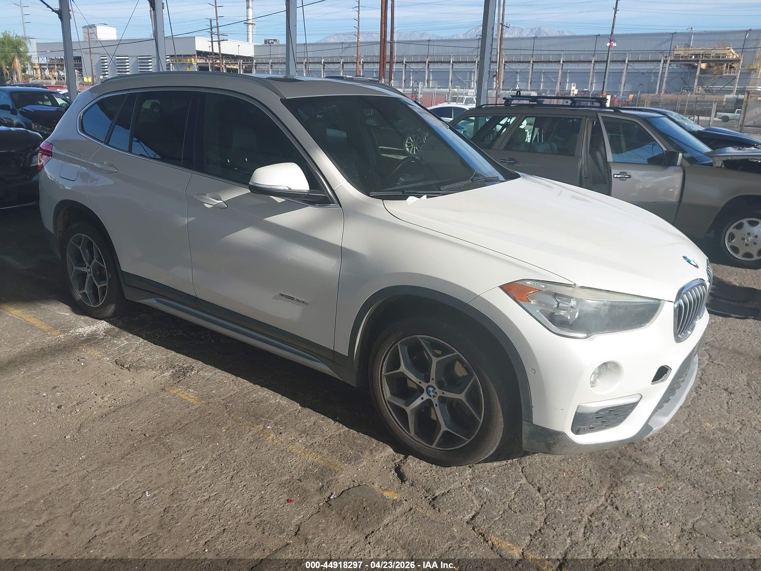 2018 BMW X1 sDrive28i, VIN WBXHU7C33J5H39315 — All over
