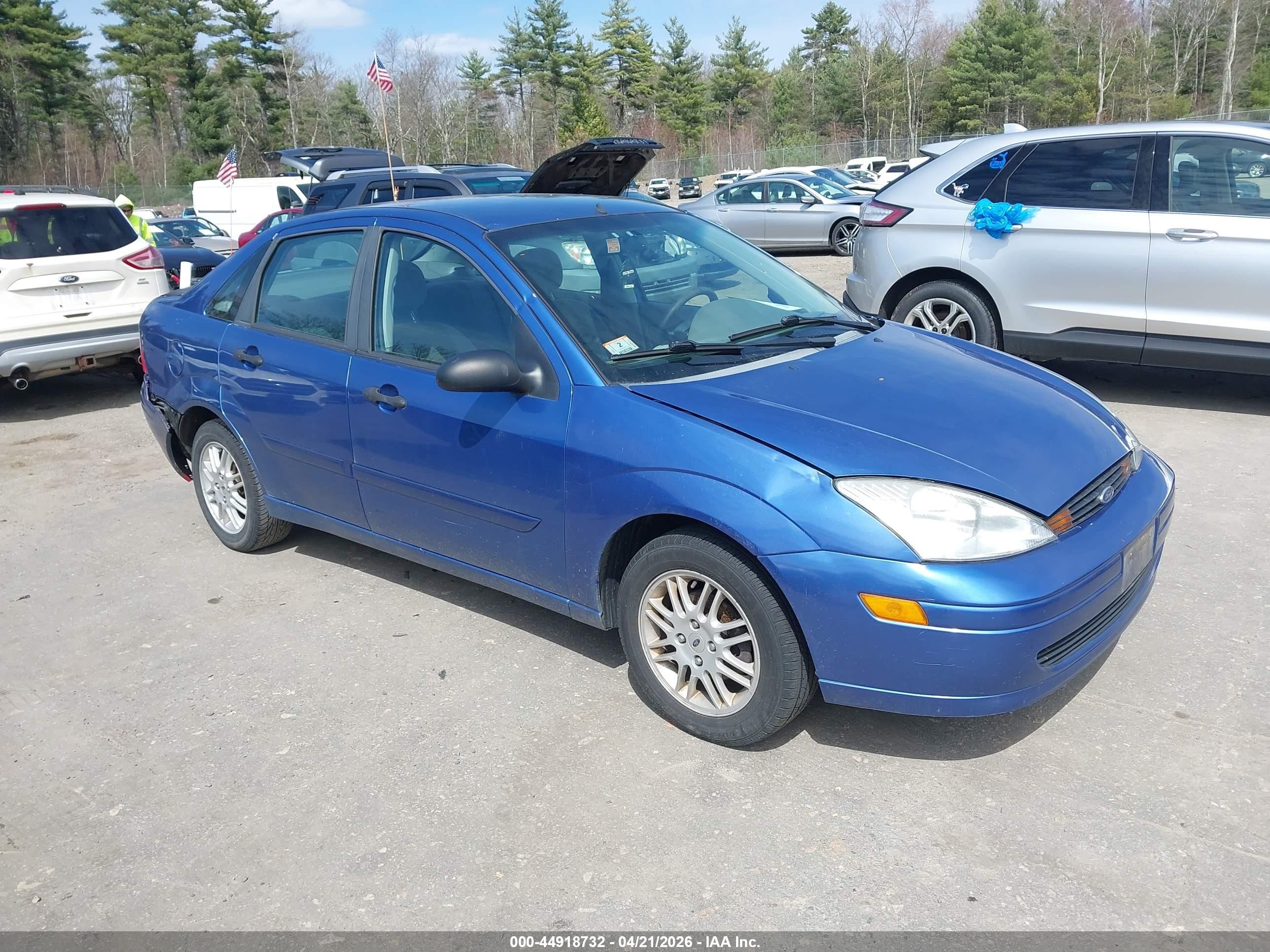 2004 Ford Focus SE, VIN 1FAFP34354W147547 — Зад
