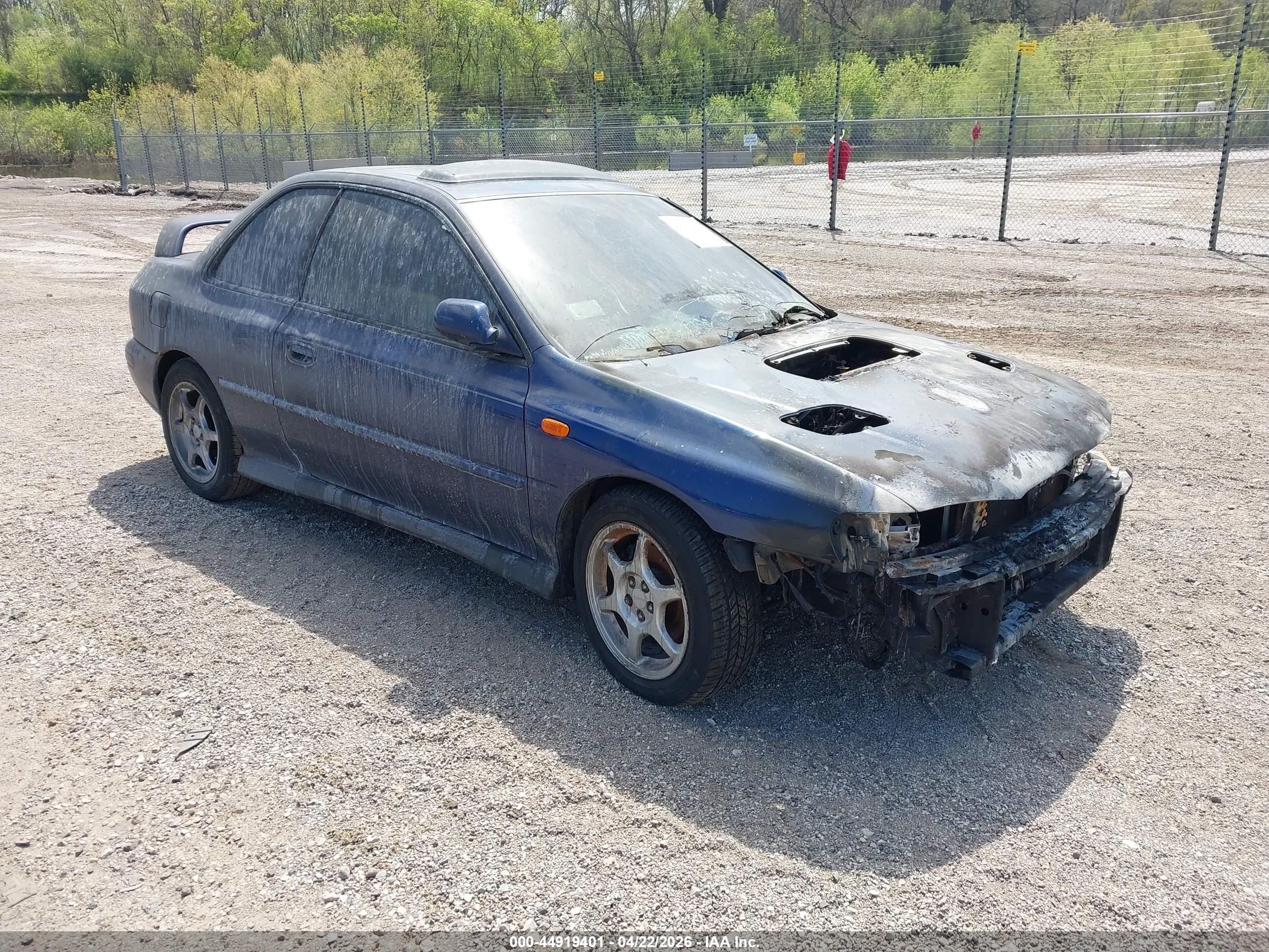 2000 Subaru Impreza RS, VIN JF1GM6759YG403524 — Engine fire