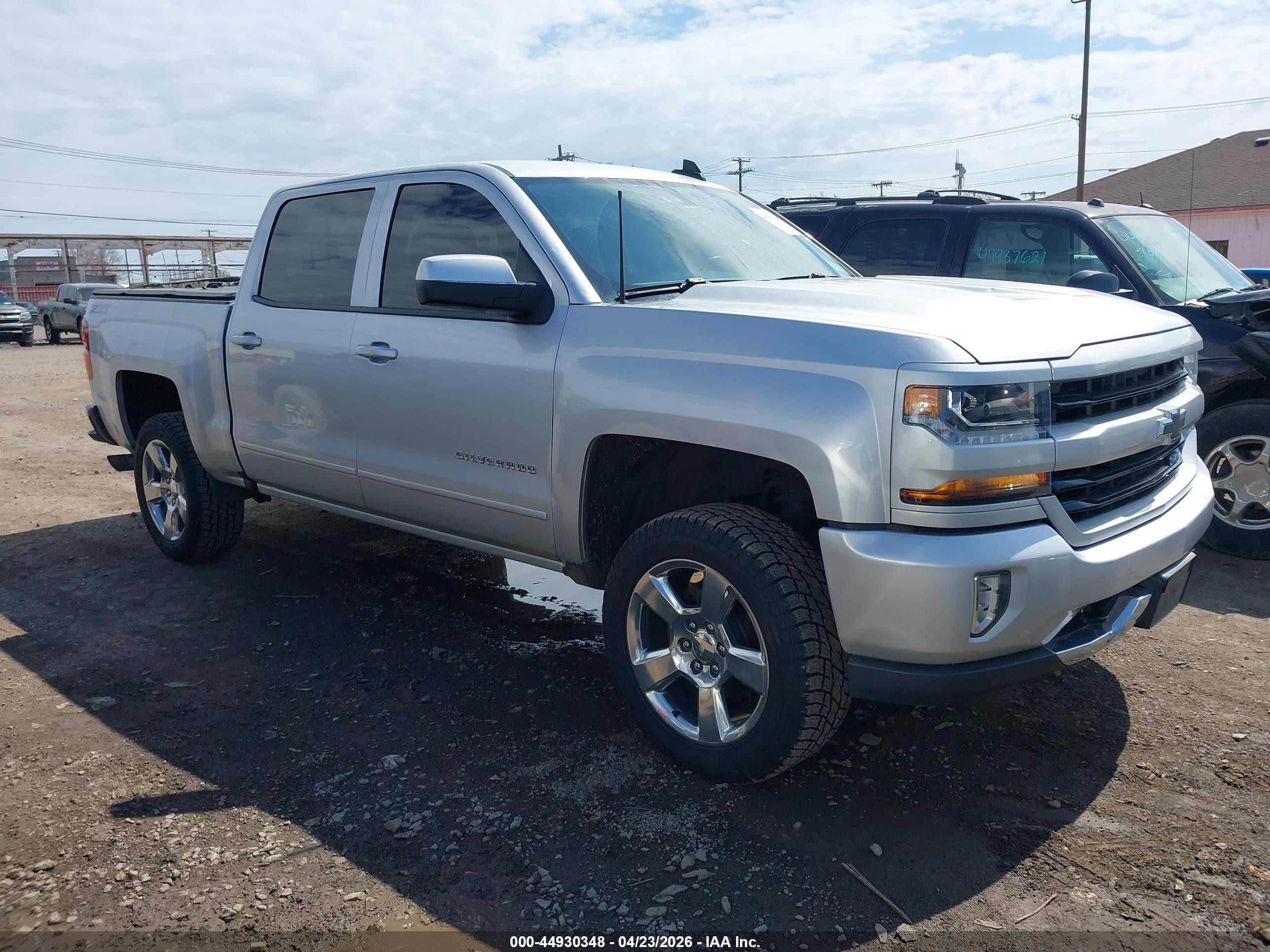 2018 Chevrolet Silverado 1500 LT, VIN 3GCUKREC9JG424390 — Hail