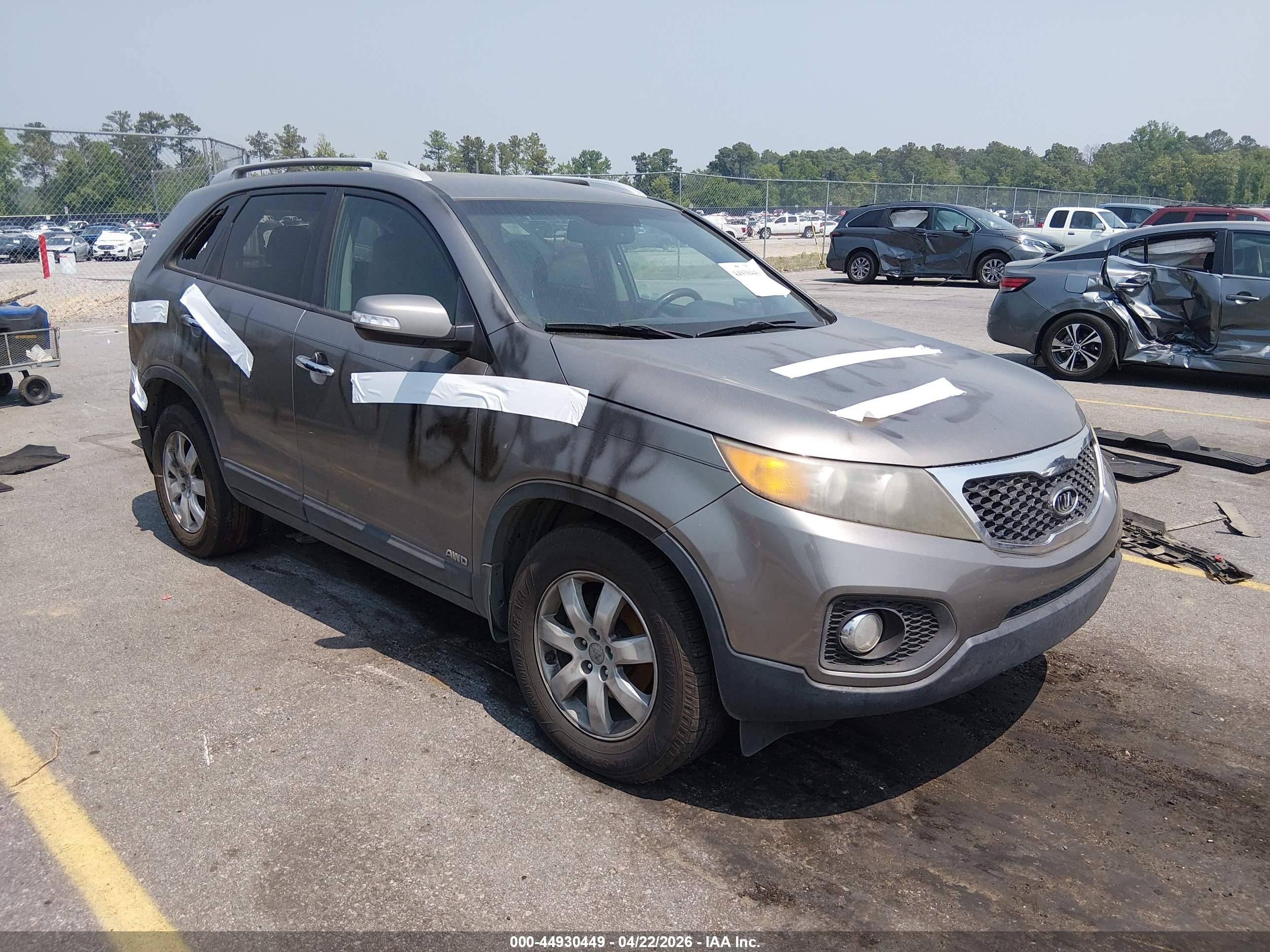 2011 Kia Sorento LX, VIN 5XYKTDA14BG154691 — Vandalism