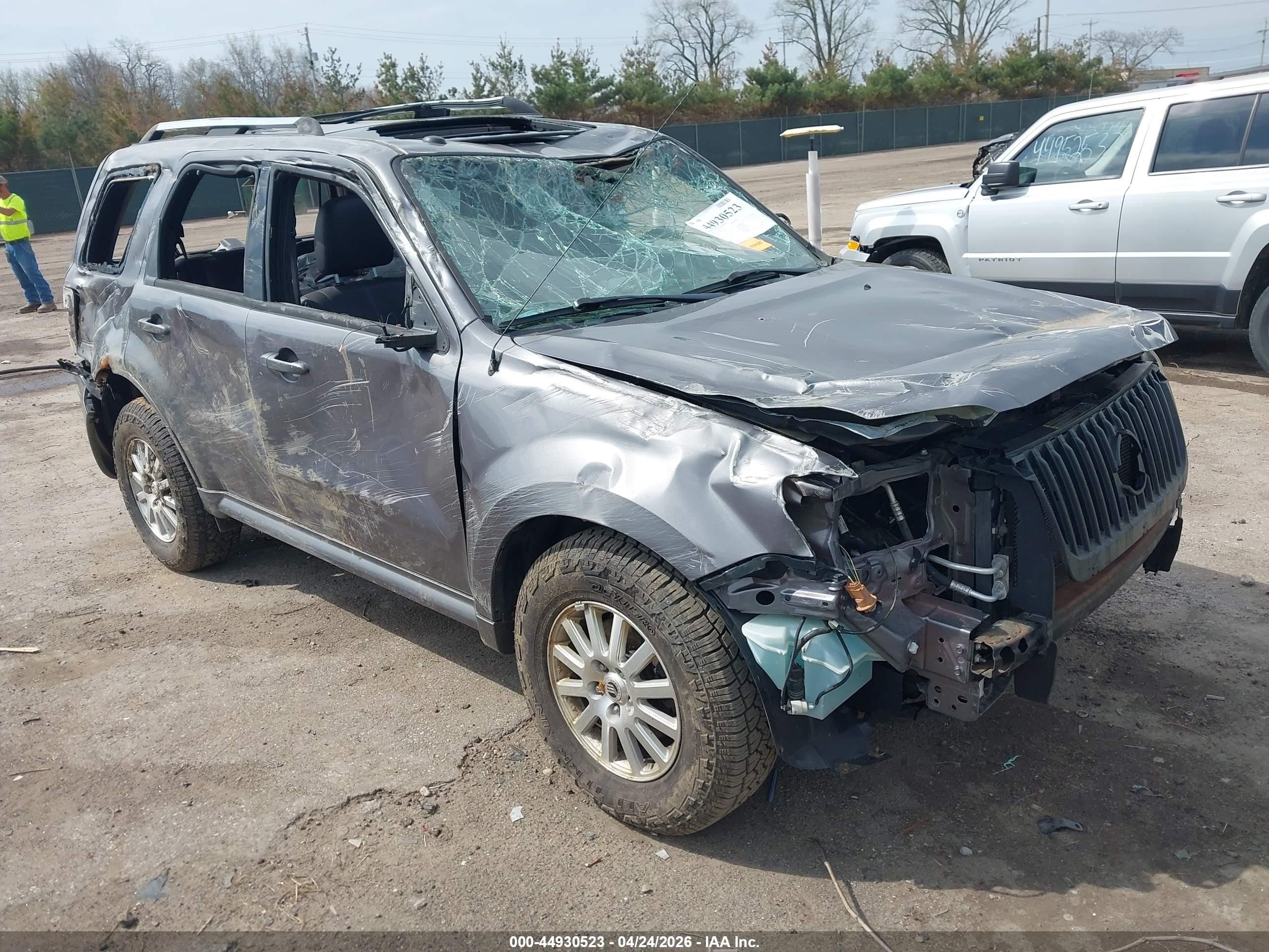 2010 Mercury Mariner Premier, VIN 4M2CN9HGXAKJ30629 — Rollover