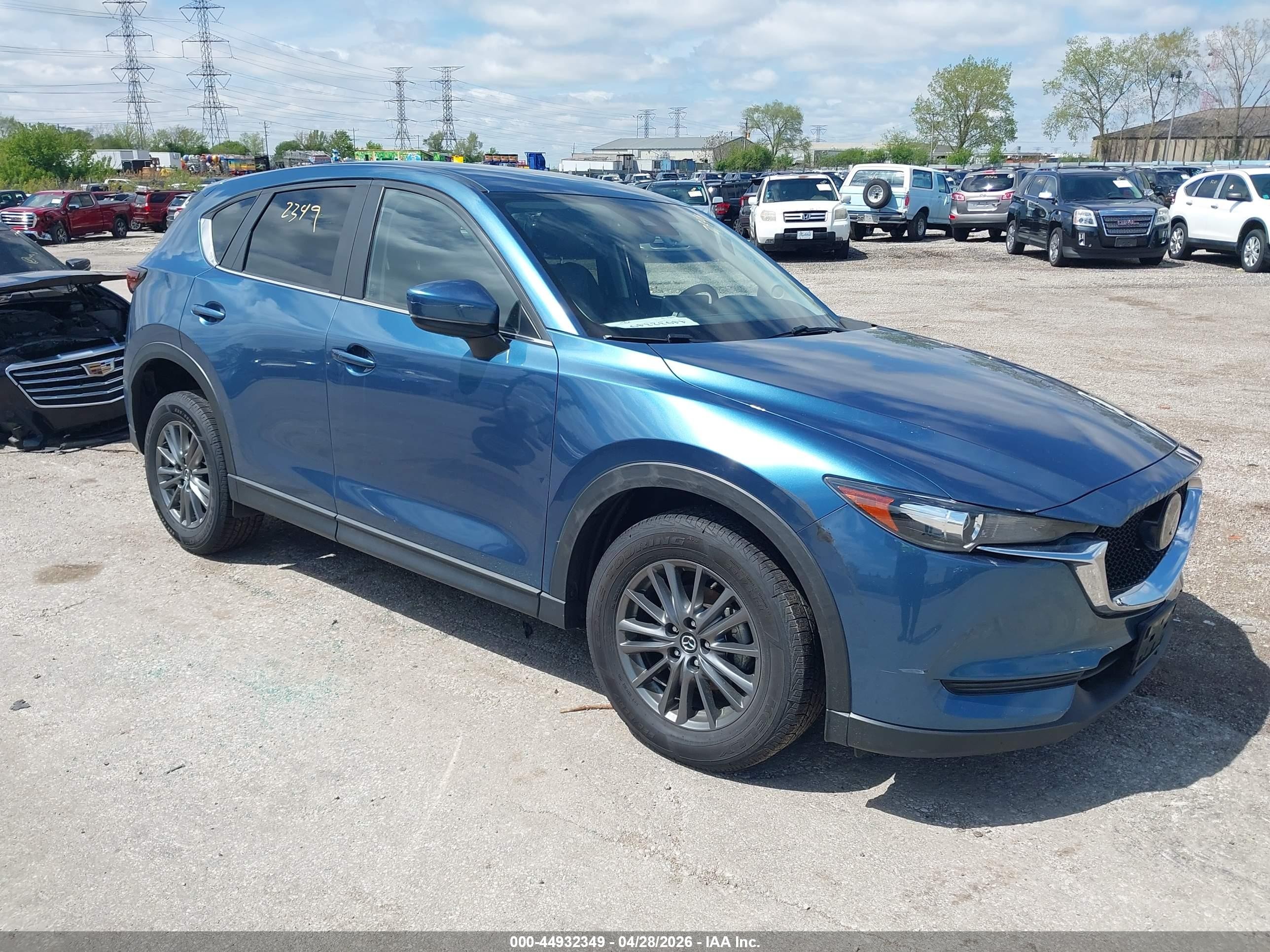 2021 Mazda CX-5 Carbon Edition, VIN JM3KFBCM7M0442207 — Side