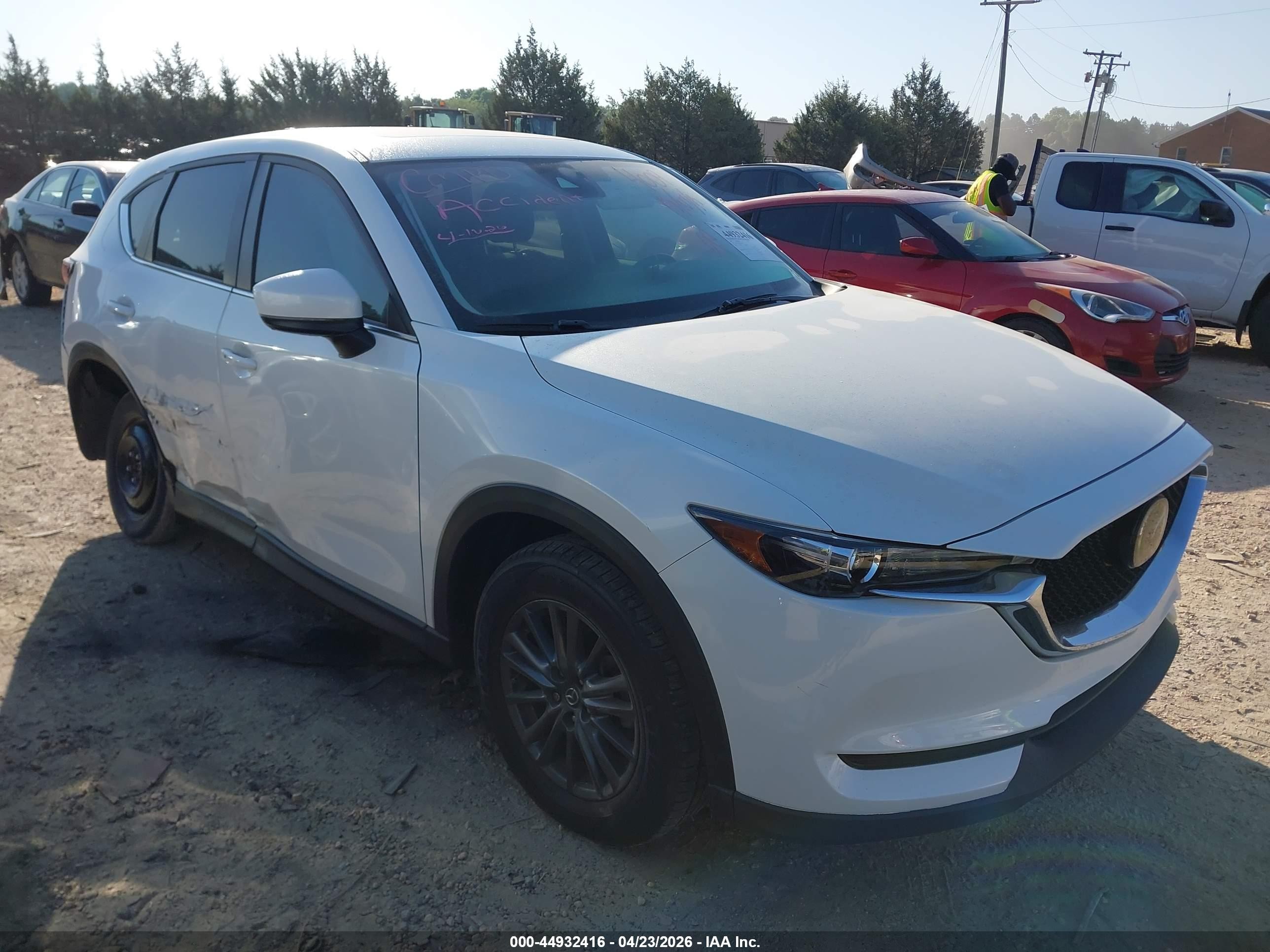 2019 Mazda CX-5 Touring, VIN JM3KFBCM9K0574009 — Side