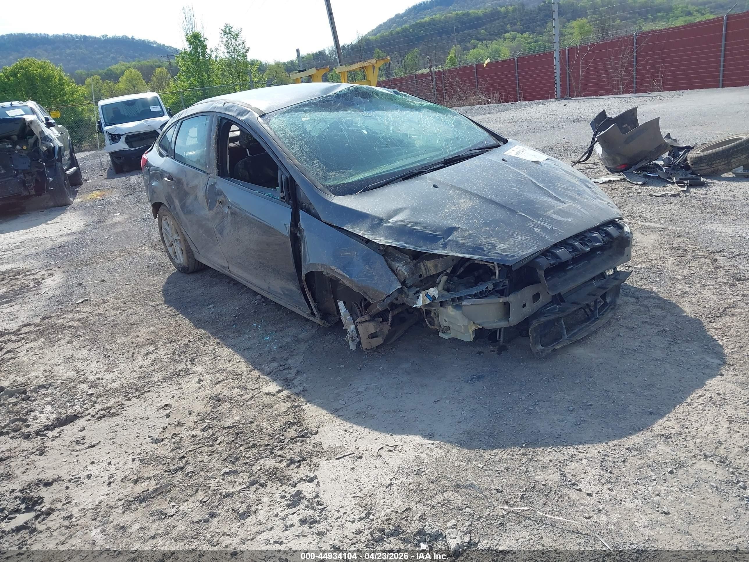 2015 Ford Focus SE, VIN 1FADP3F24FL373630 — Rollover