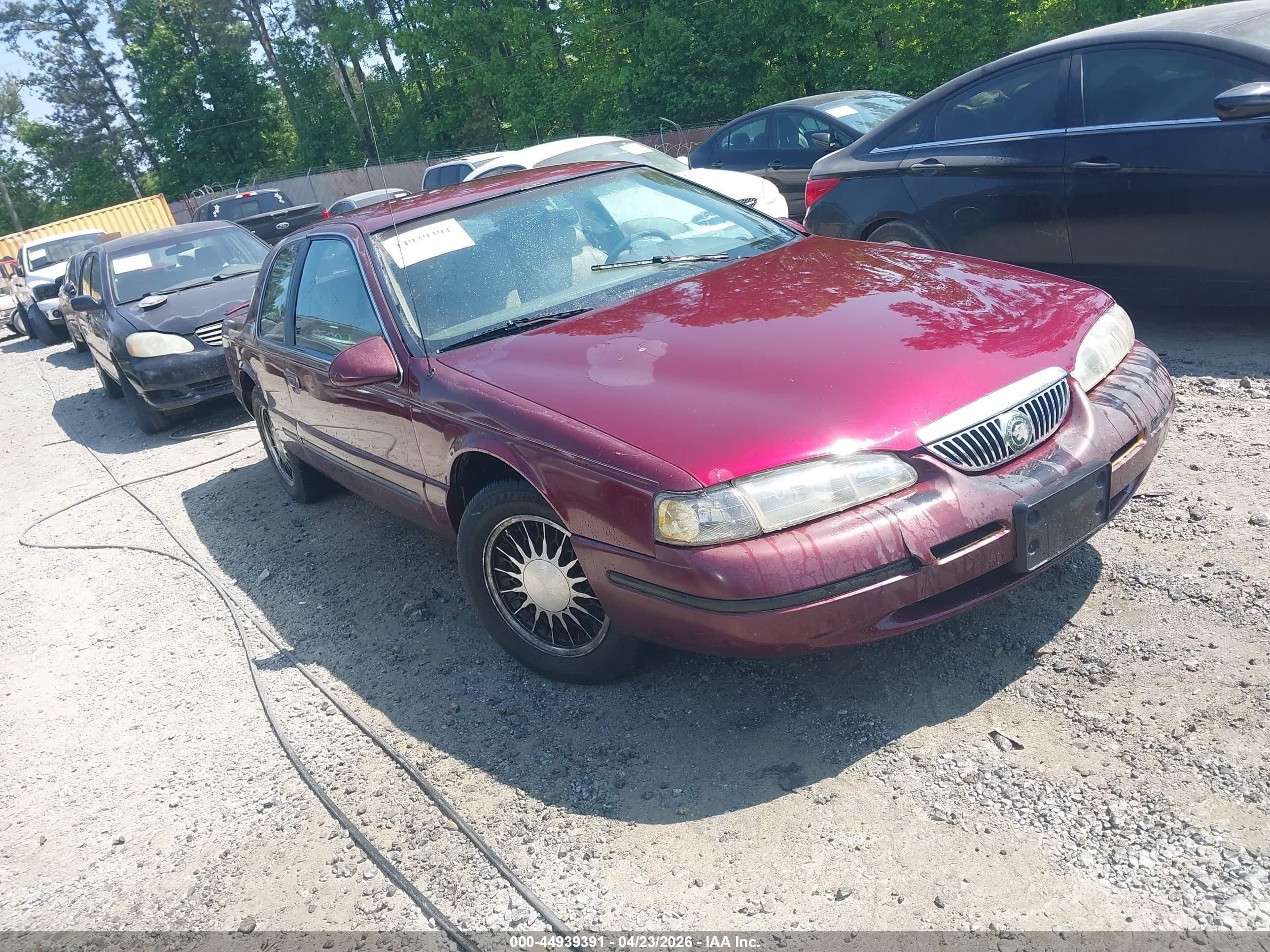 1997 Mercury Cougar, VIN 1MELM62WXVH603602 — Бок