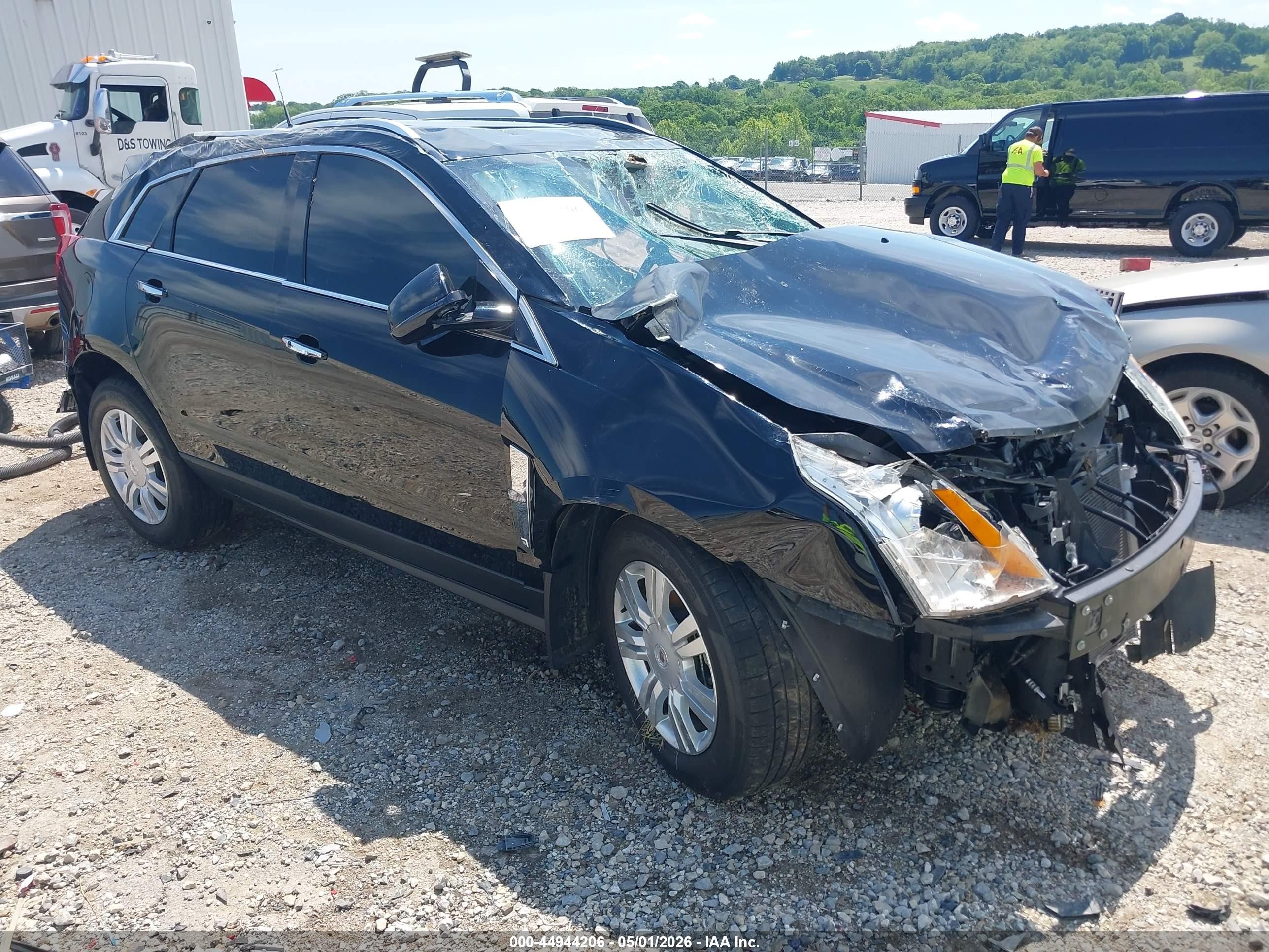 2012 Cadillac SRX Luxury Collection, VIN 3GYFNAE30CS577185 — Rollover