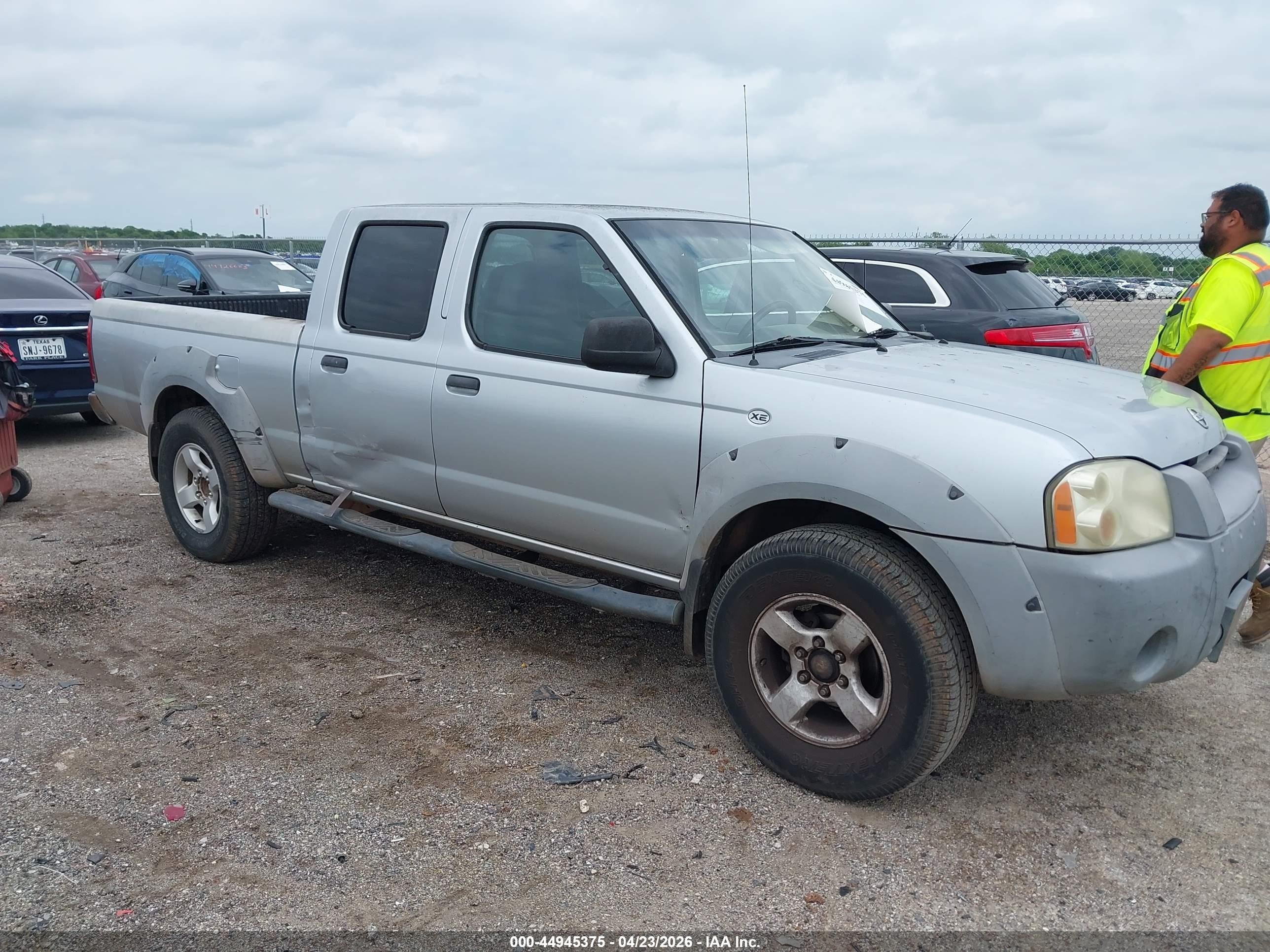 2002 Nissan Frontier XE, VIN 1N6ED29X12C307536 — Side