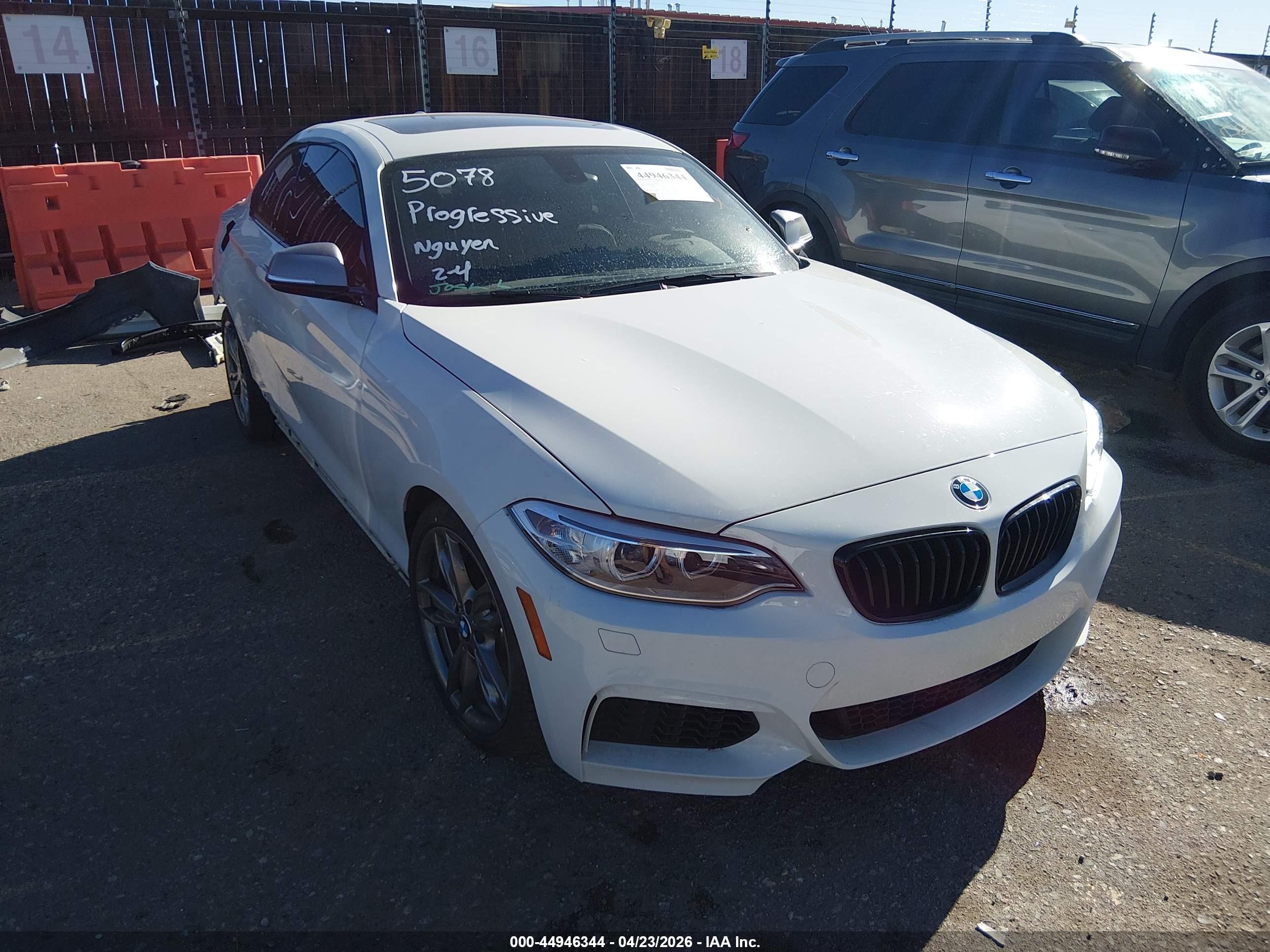 2015 BMW 2 Series M235i, VIN WBA1J7C5XFV289088 — Rear end