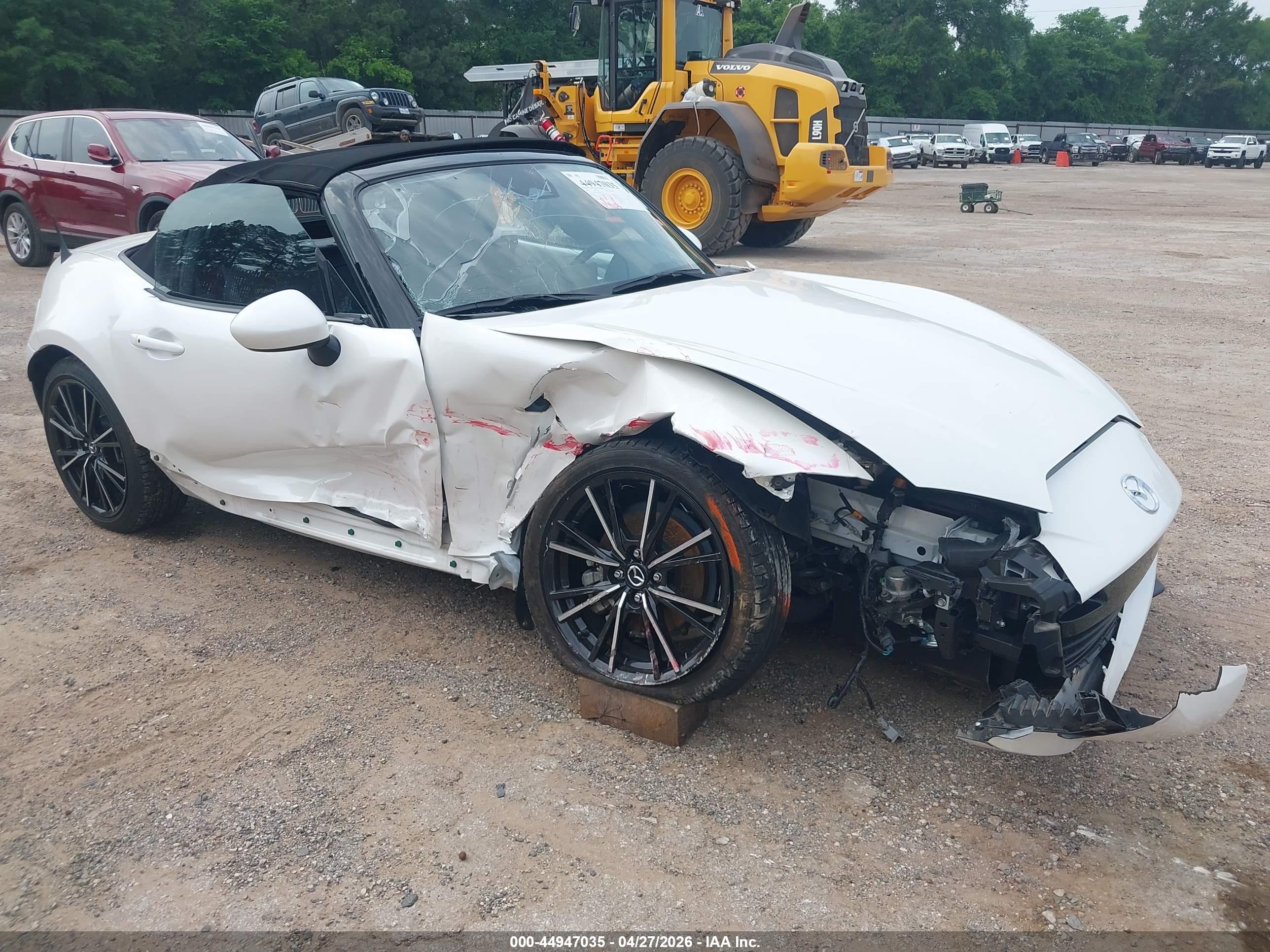 2024 Mazda MX-5 Miata Grand Touring, VIN JM1NDAD76R0606097 — Side