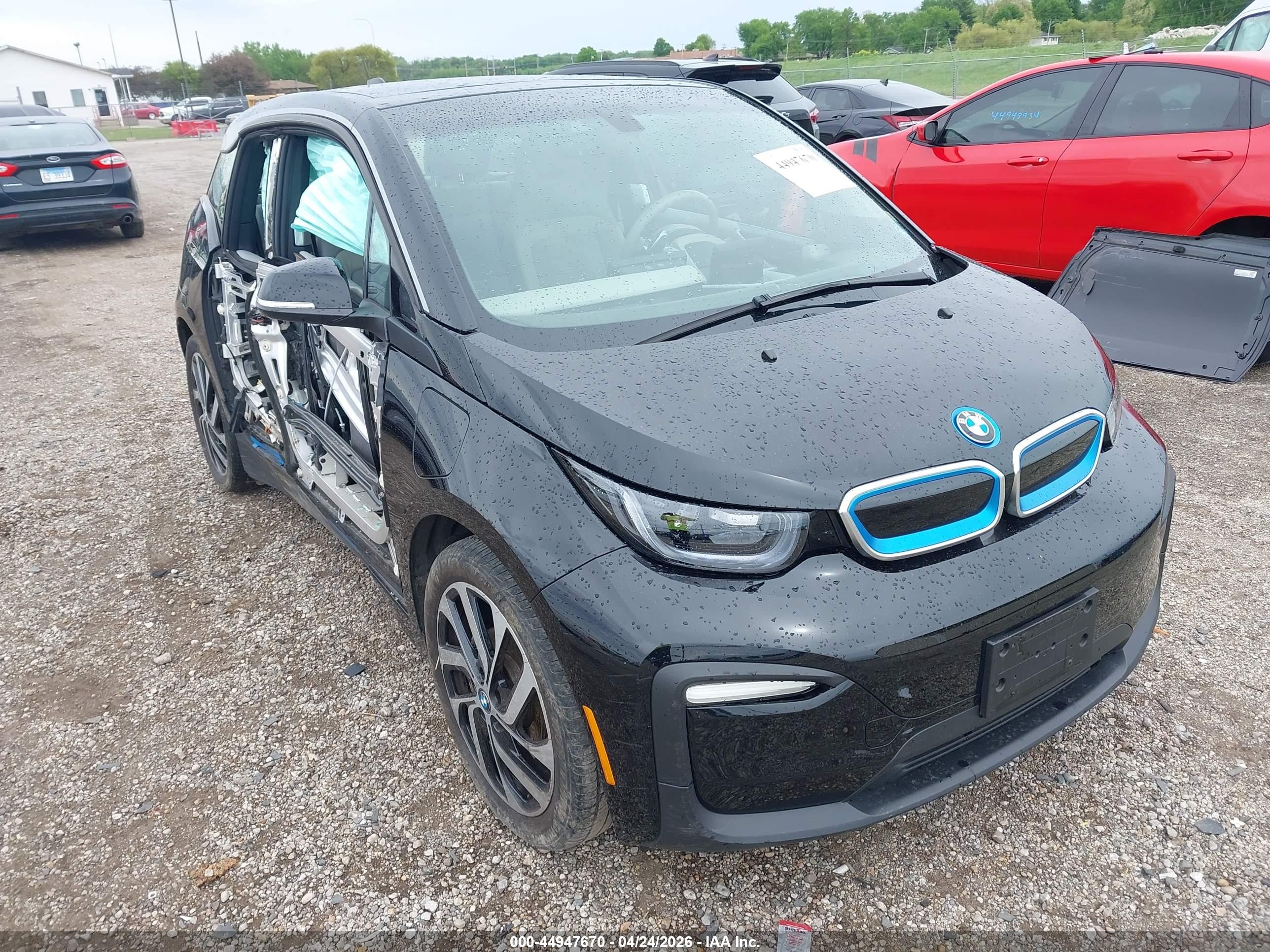 2018 BMW i3, VIN WBY7Z4C5XJVD96883 — Бок