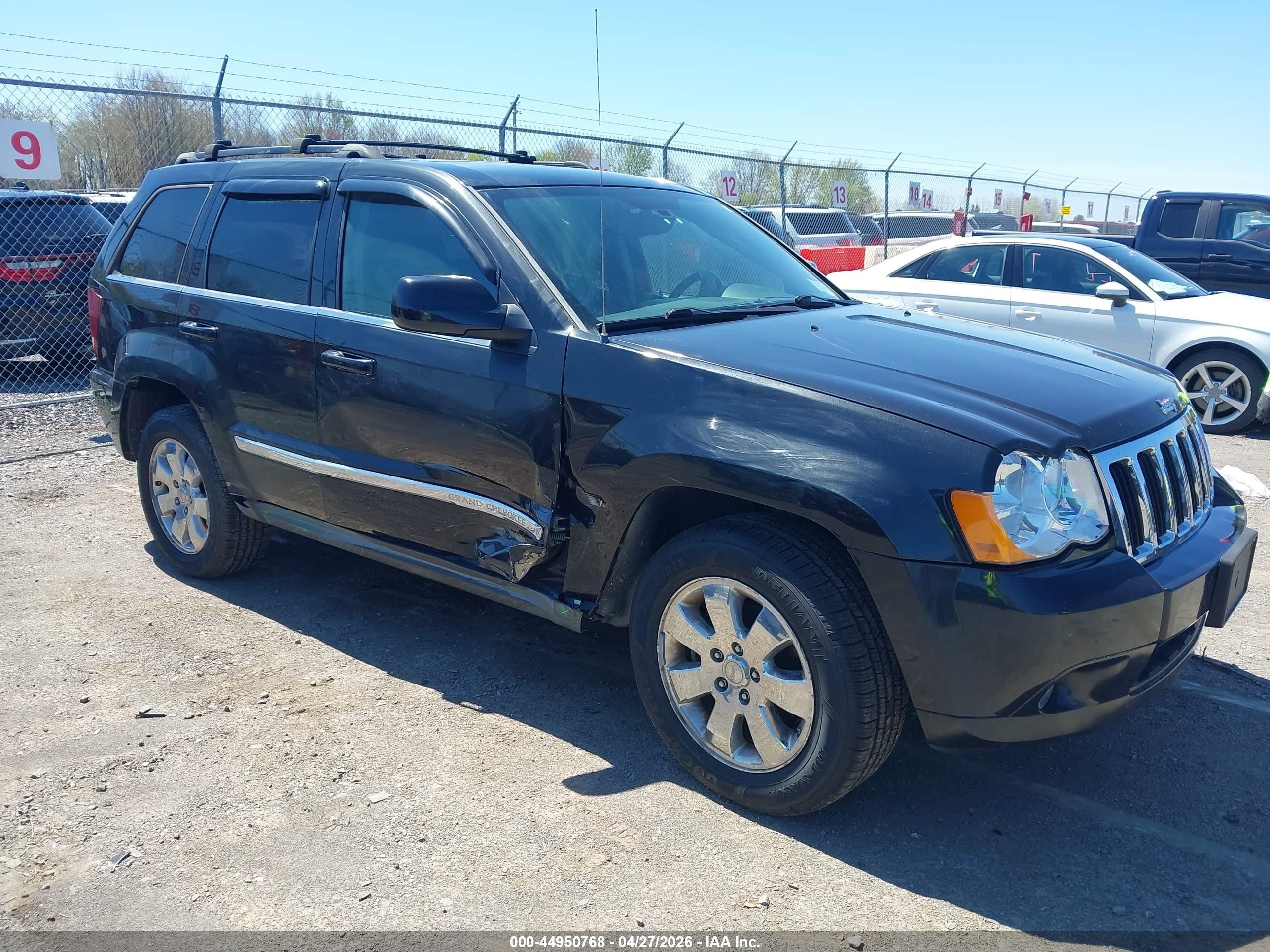 2009 Jeep Grand Cherokee Limited, VIN 1J8HR58P09C548012 — Side