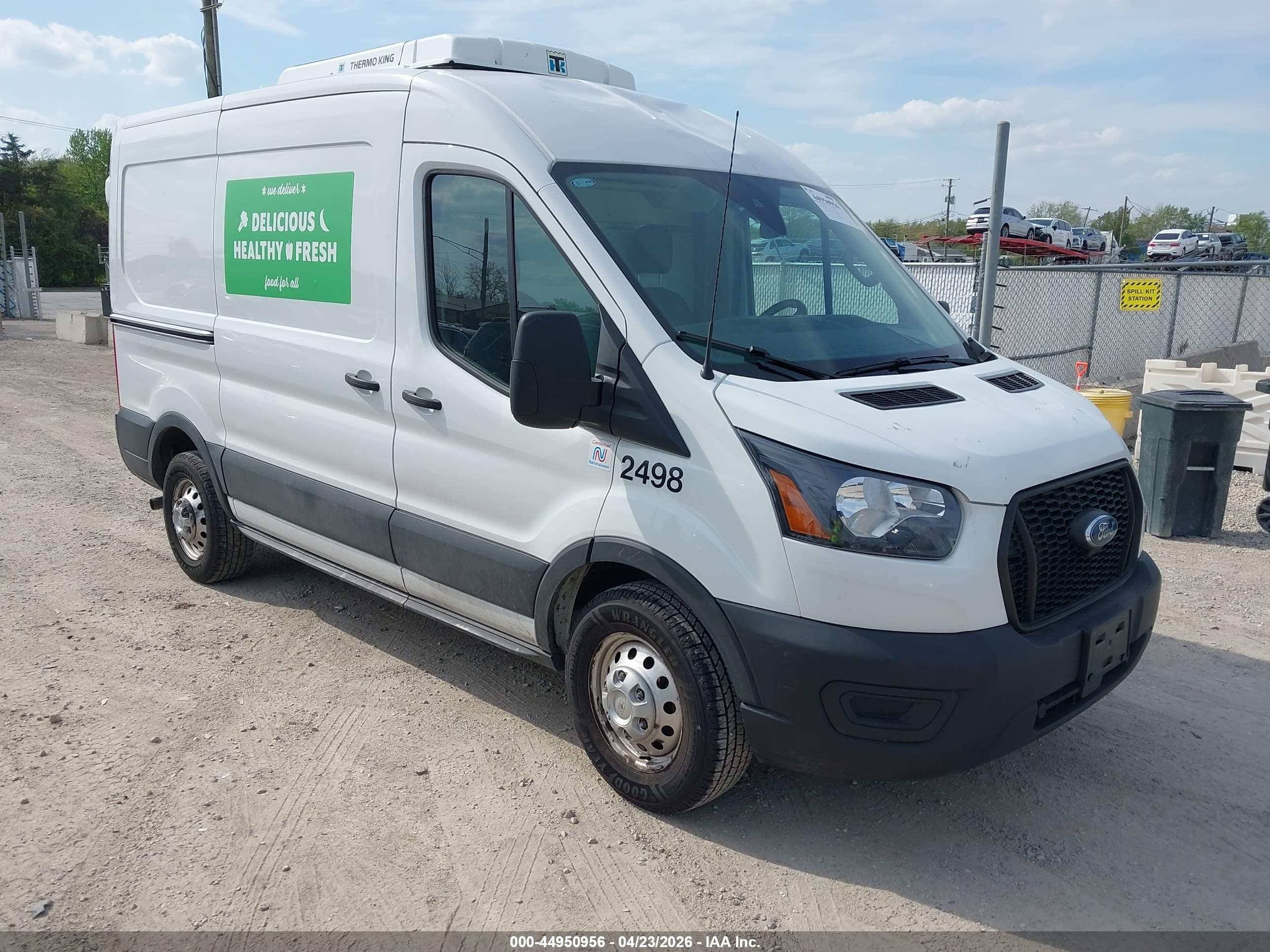 2023 Ford Transit Cargo, VIN 1FTBW9C88PKA39821 — Бок