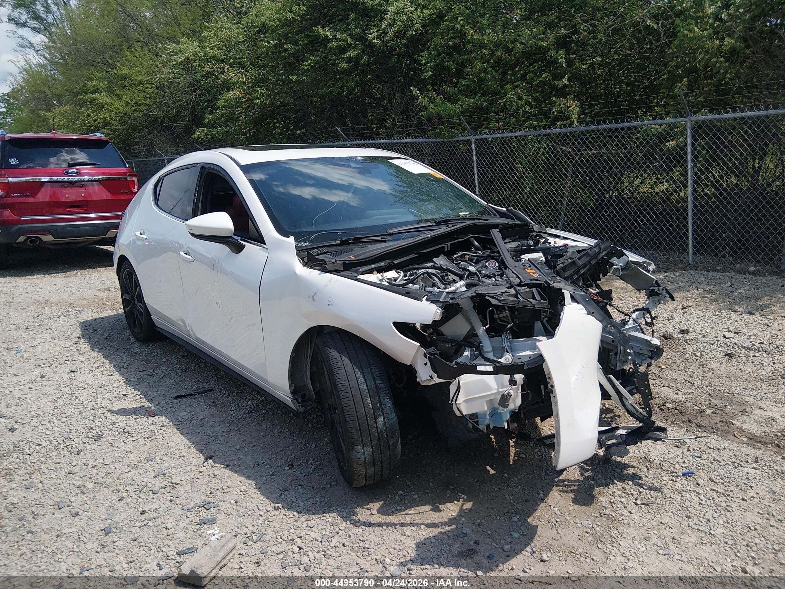 2021 Mazda 3 Premium, VIN JM1BPAML7M1313996 — Front end