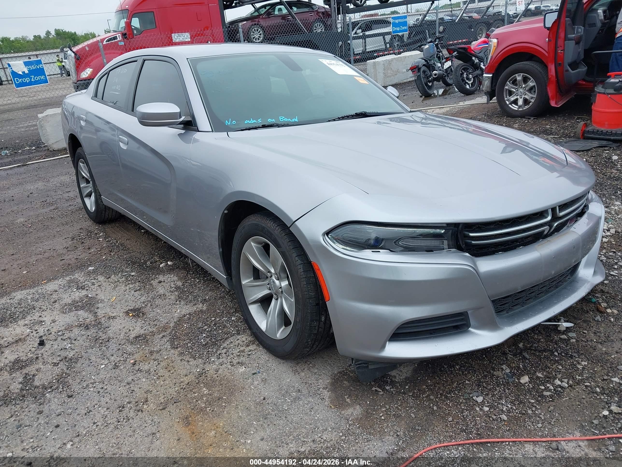 2015 Dodge Charger SE, VIN 2C3CDXBG2FH734667 — Side