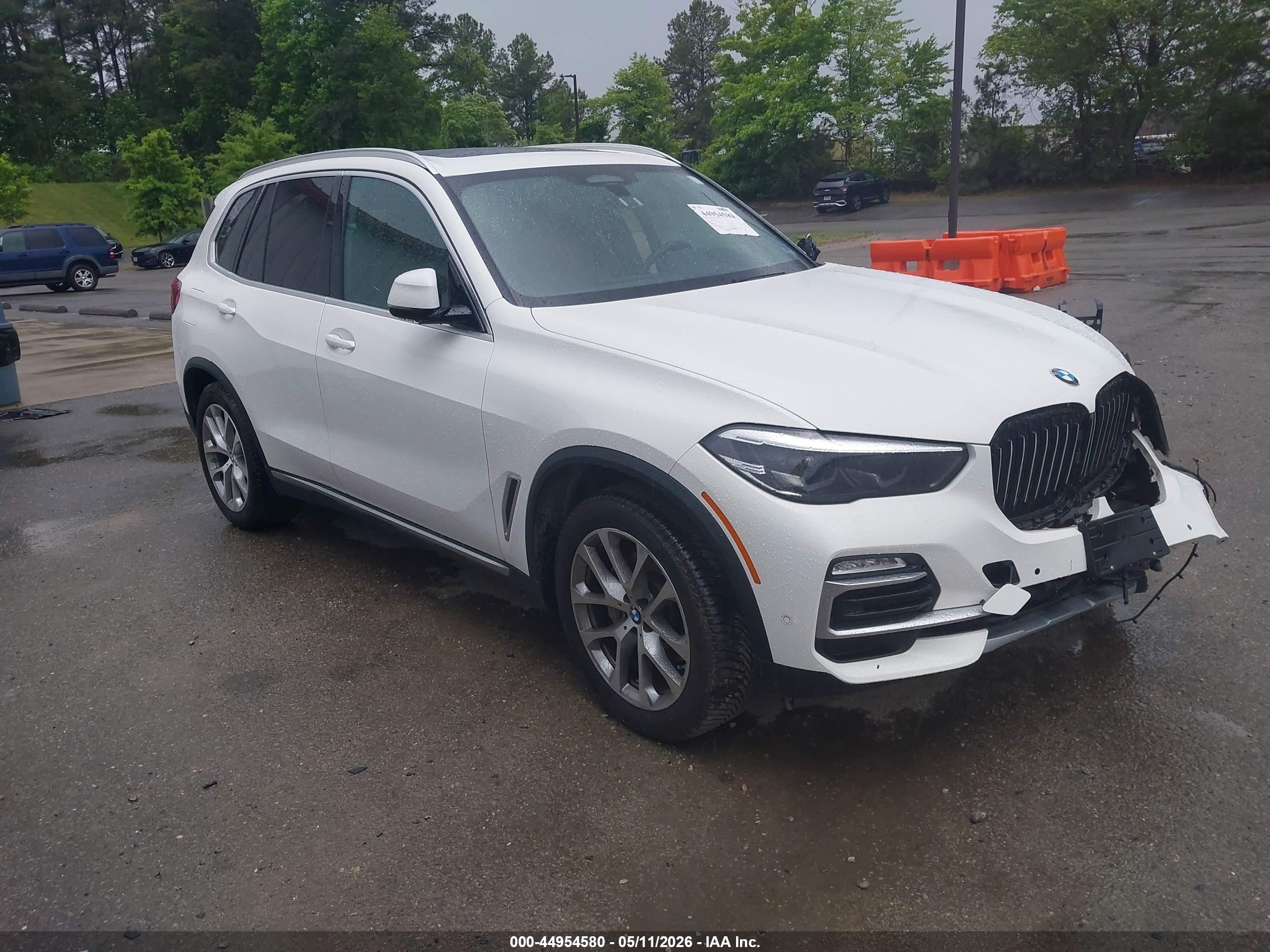 2020 BMW X5 xDrive40i, VIN 5UXCR6C0XL9C61560 — Бок