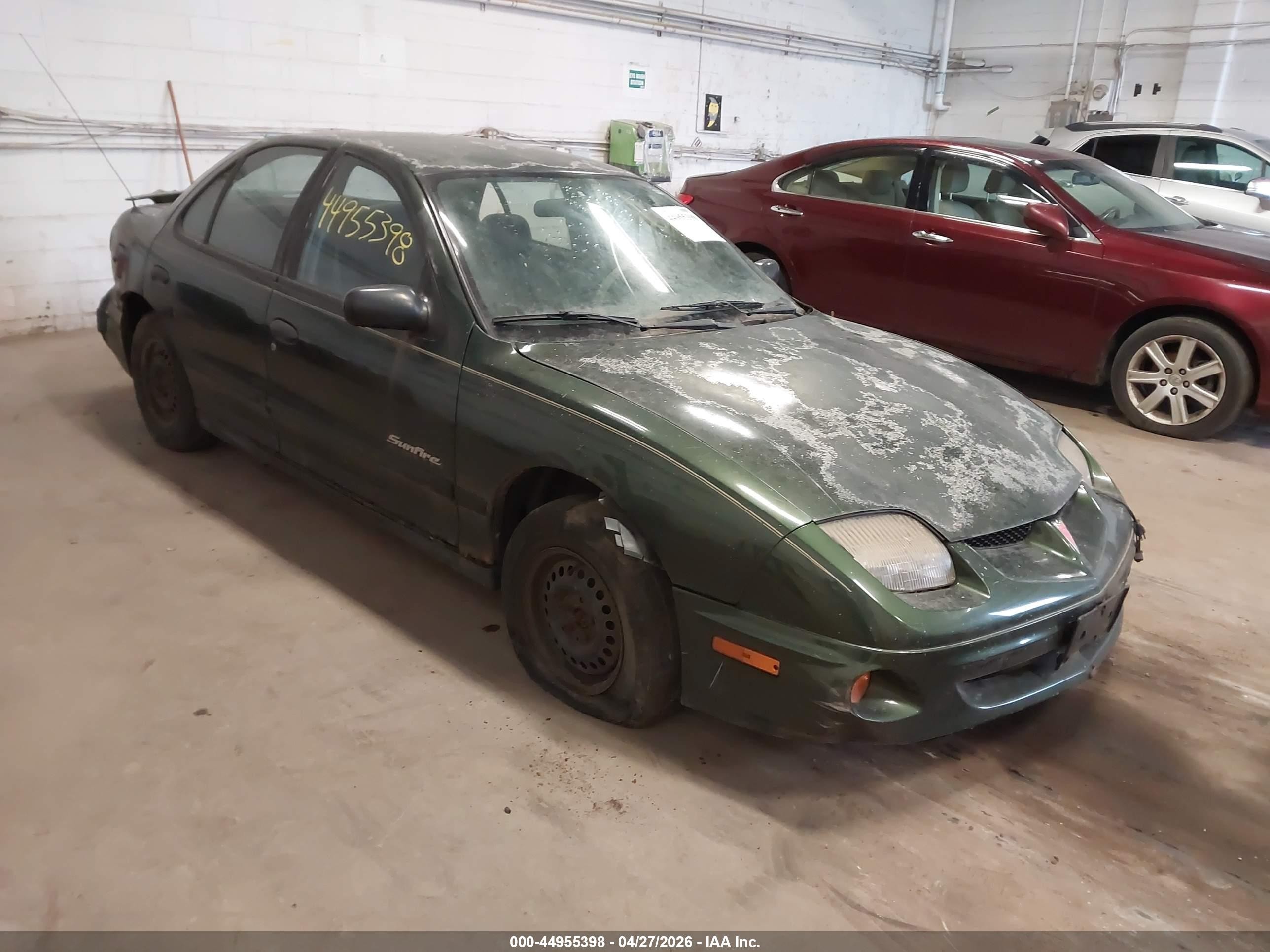 2000 Pontiac Sunfire SE, VIN 1G2JB5249Y7405048 — Normal wear