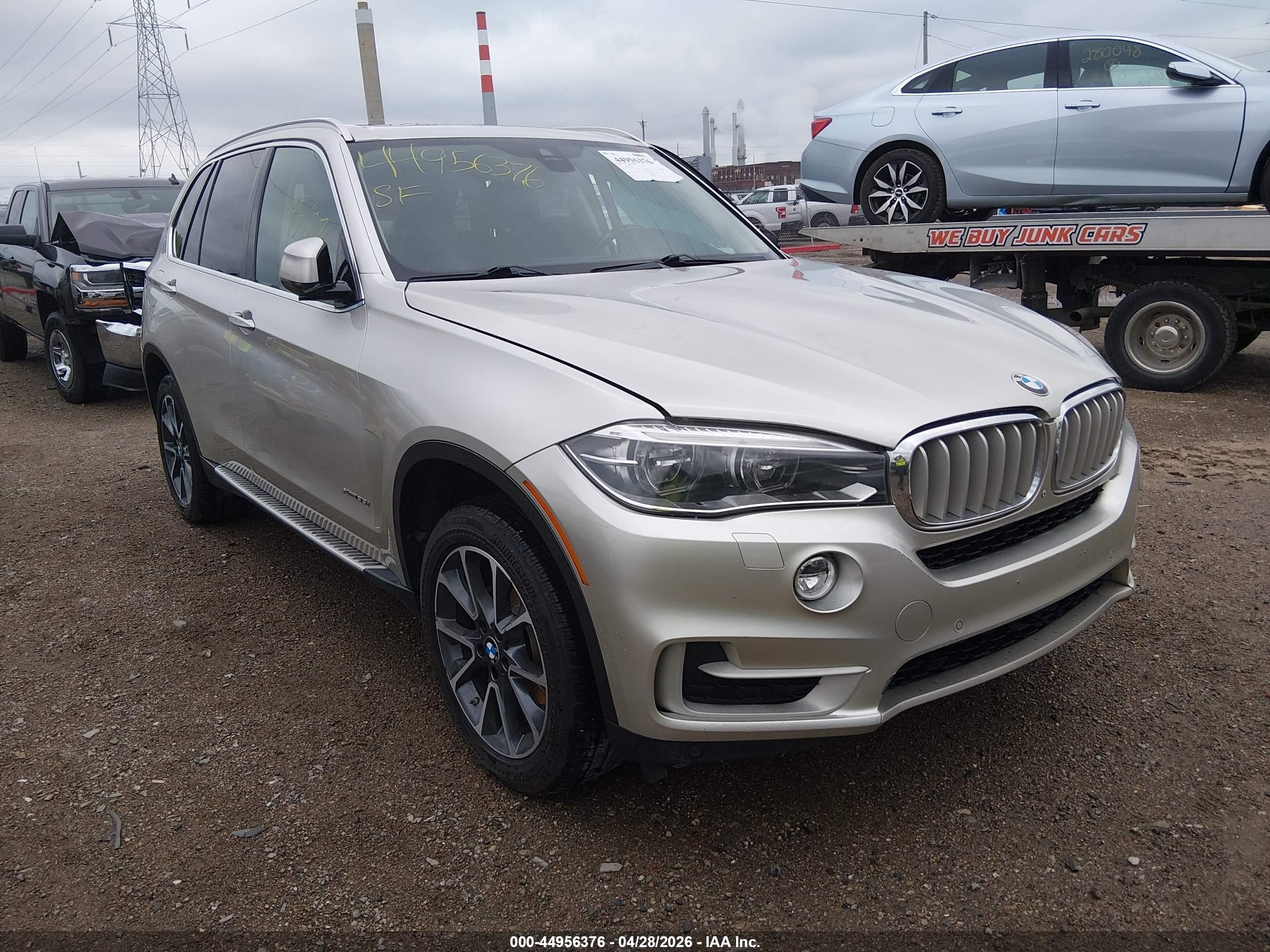 2015 BMW X5 xDrive35i, VIN 5UXKR0C57F0K56021 — Side