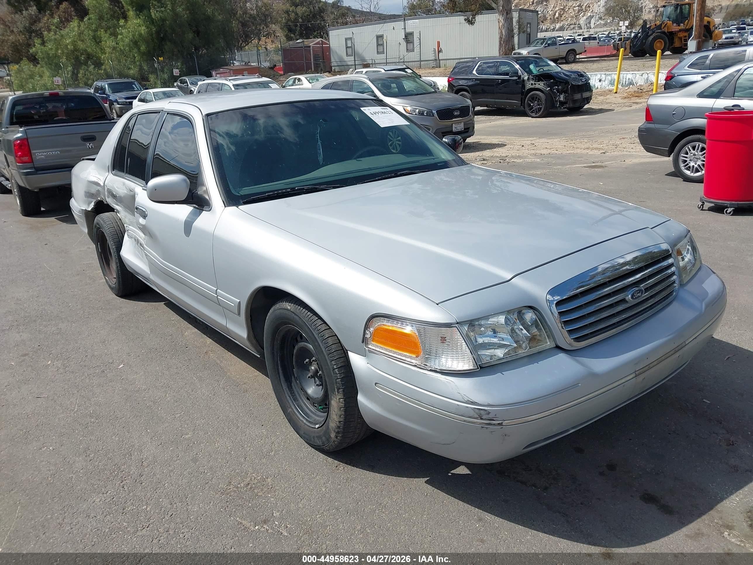 1998 Ford Crown Victoria, VIN 2FAFP73W4WX116347 — Side