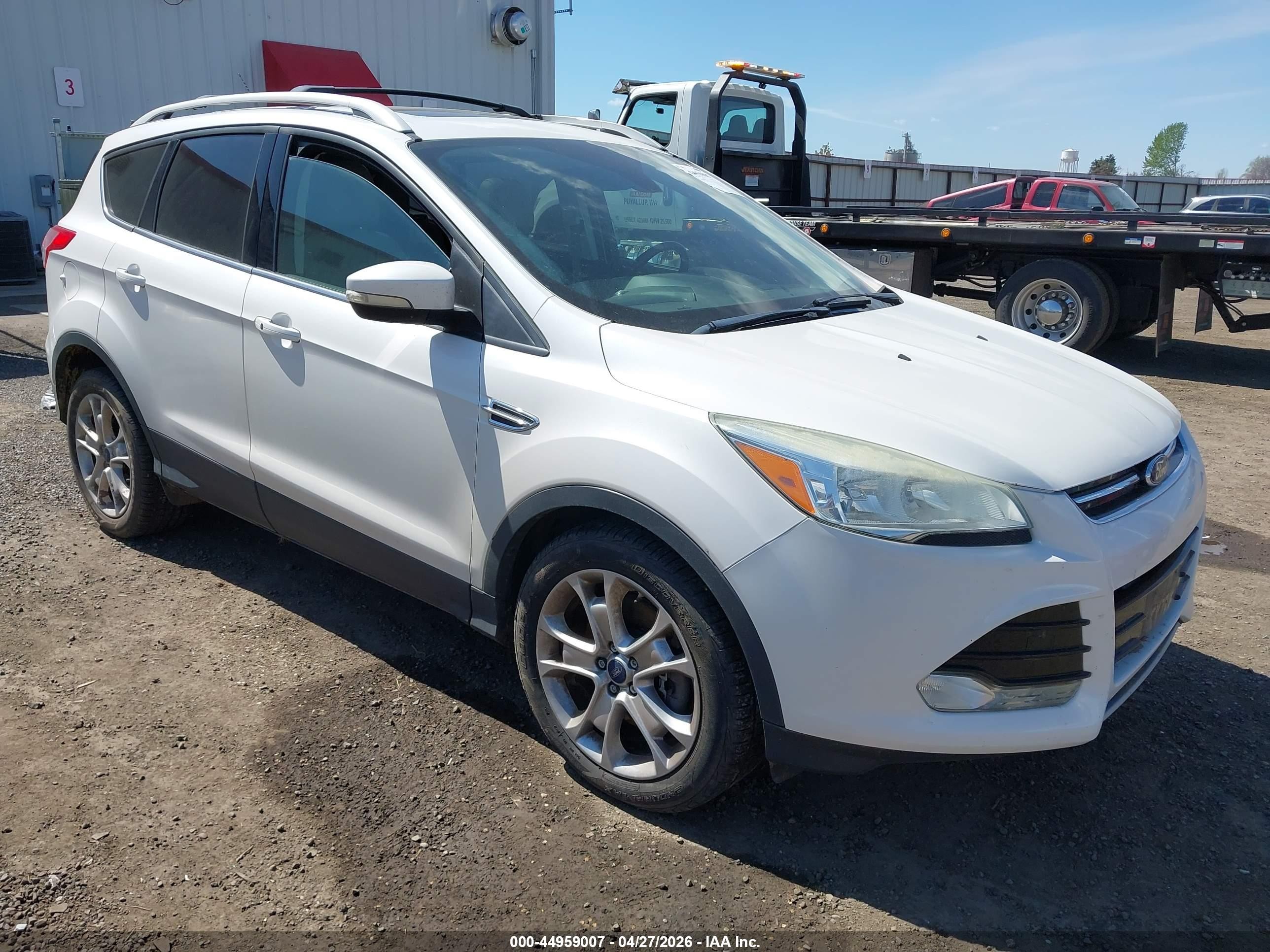 2016 Ford Escape Titanium, VIN 1FMCU9J91GUA15169 — Fresh water flood