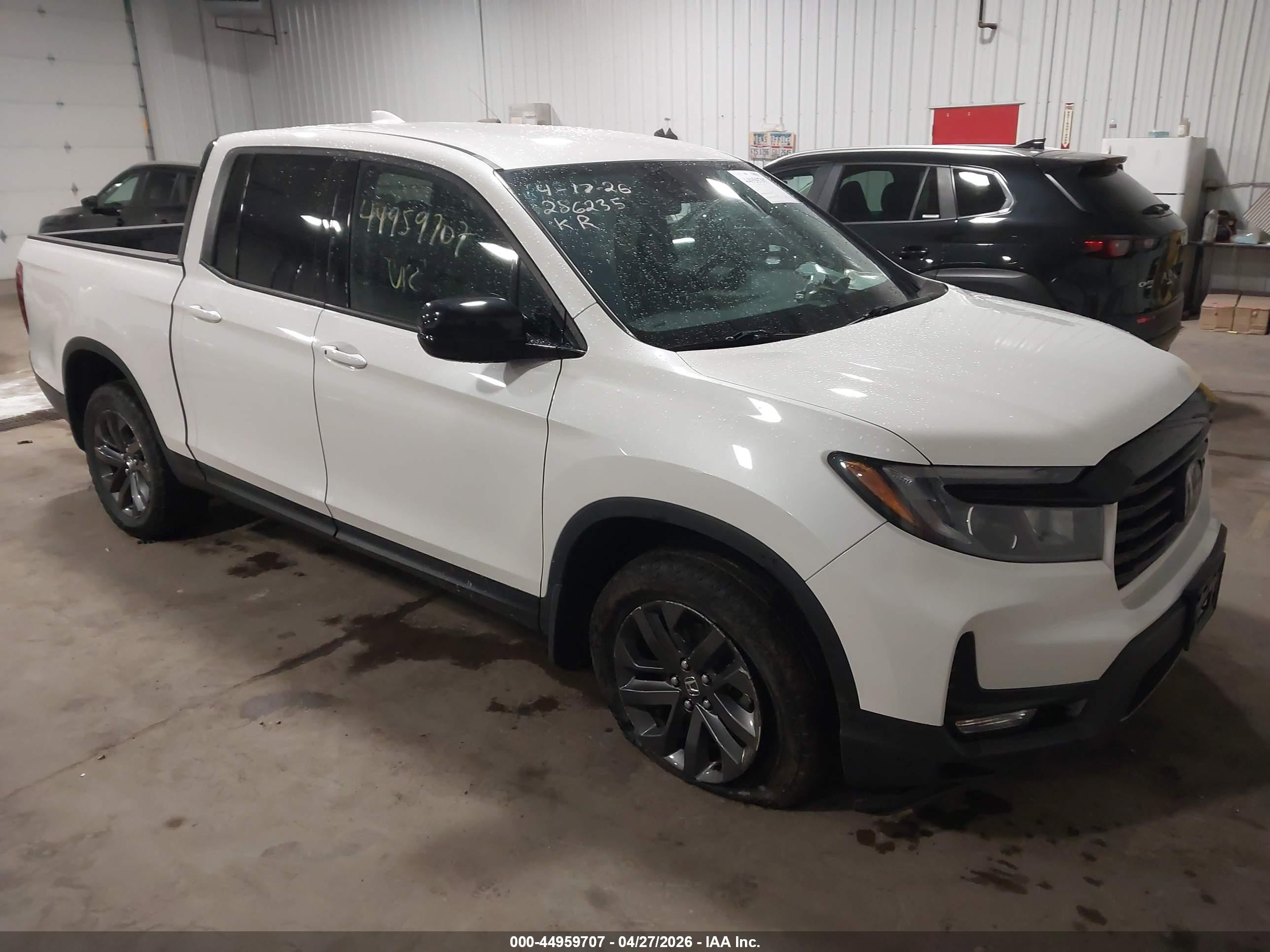 2021 Honda Ridgeline Sport, VIN 5FPYK3F17MB005094 — Side