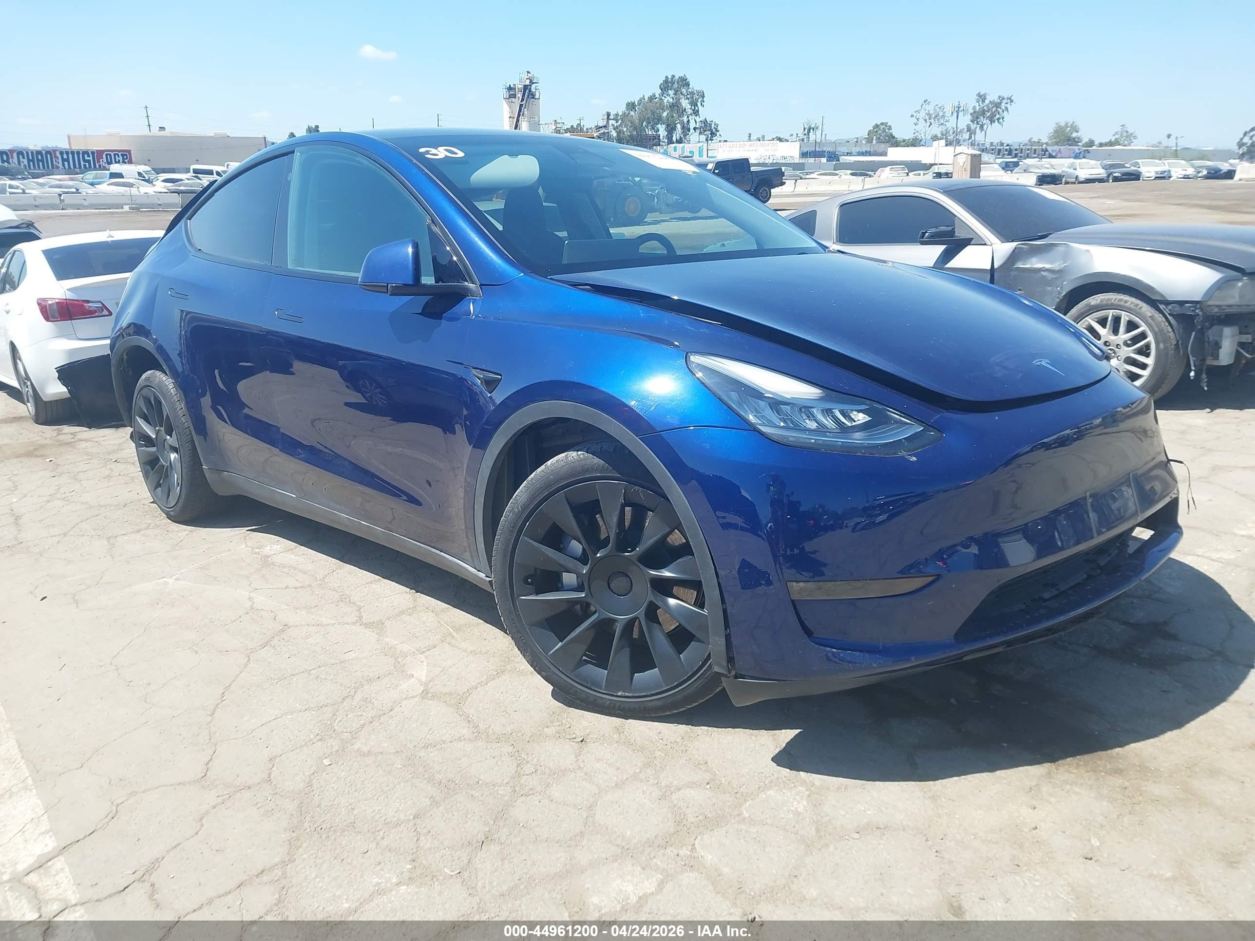2023 Tesla Model Y Long Range, VIN 7SAYGDEE8PA051106 — Rear end