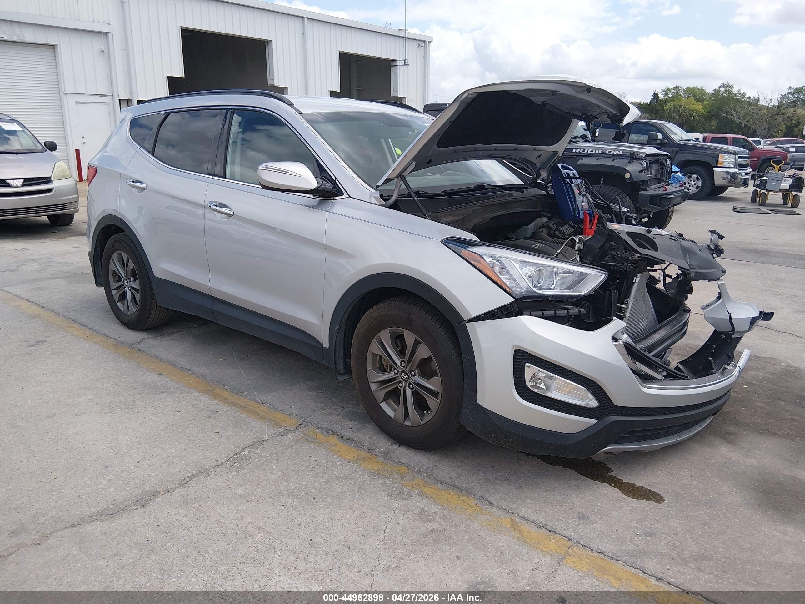 2013 Hyundai Santa Fe Sport, VIN 5XYZU3LB3DG055519 — Front end