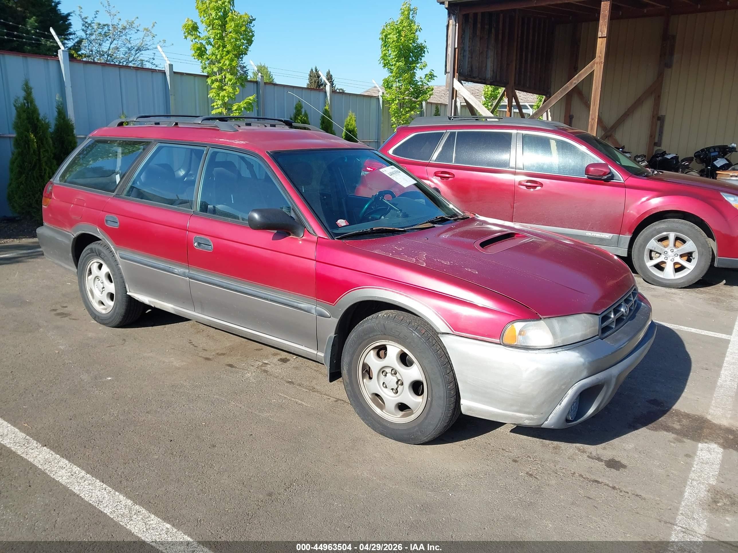1997 Subaru Legacy Outback, VIN 4S3BG6852V7614425 — Бок