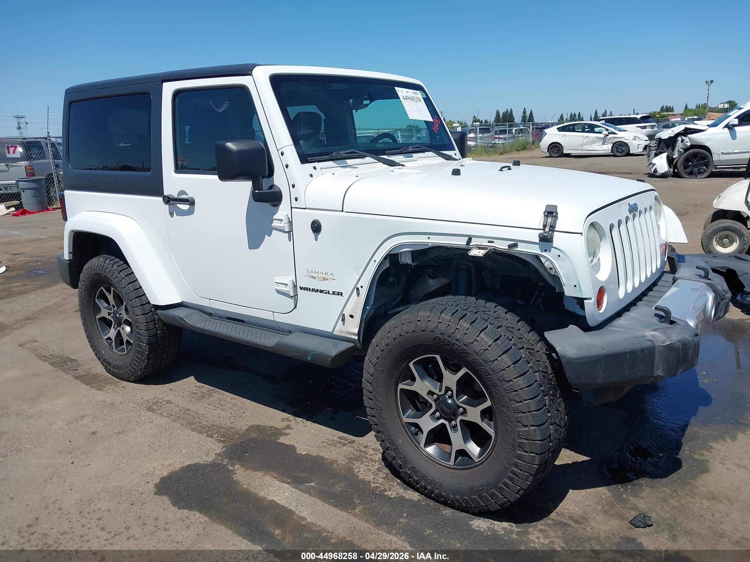 2012 Jeep Wrangler Sahara, VIN 1C4AJWBG7CL170308 — Front end