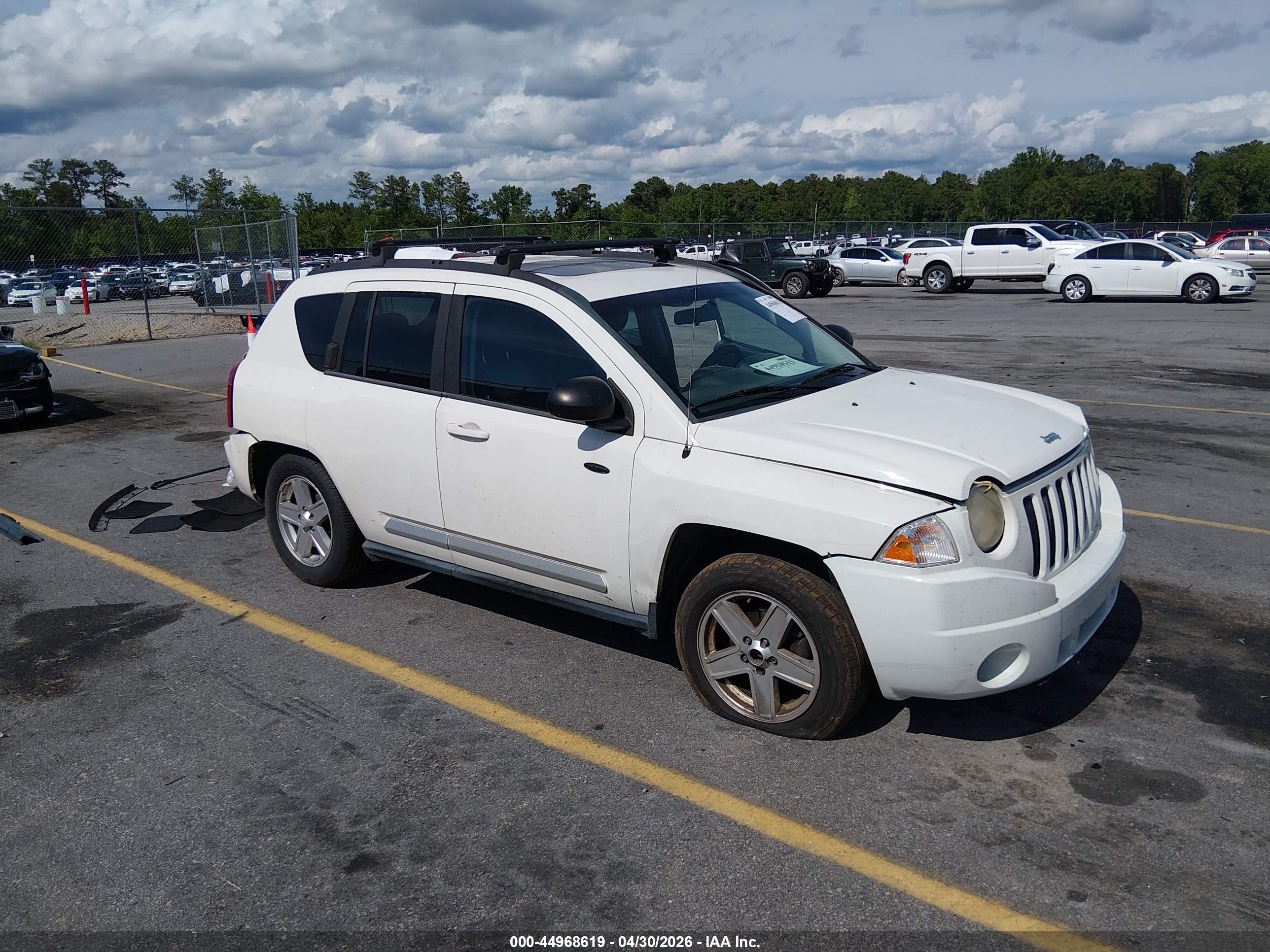 2010 Jeep Compass Sport, VIN 1J4NT1FA2AD621716 — Rear end